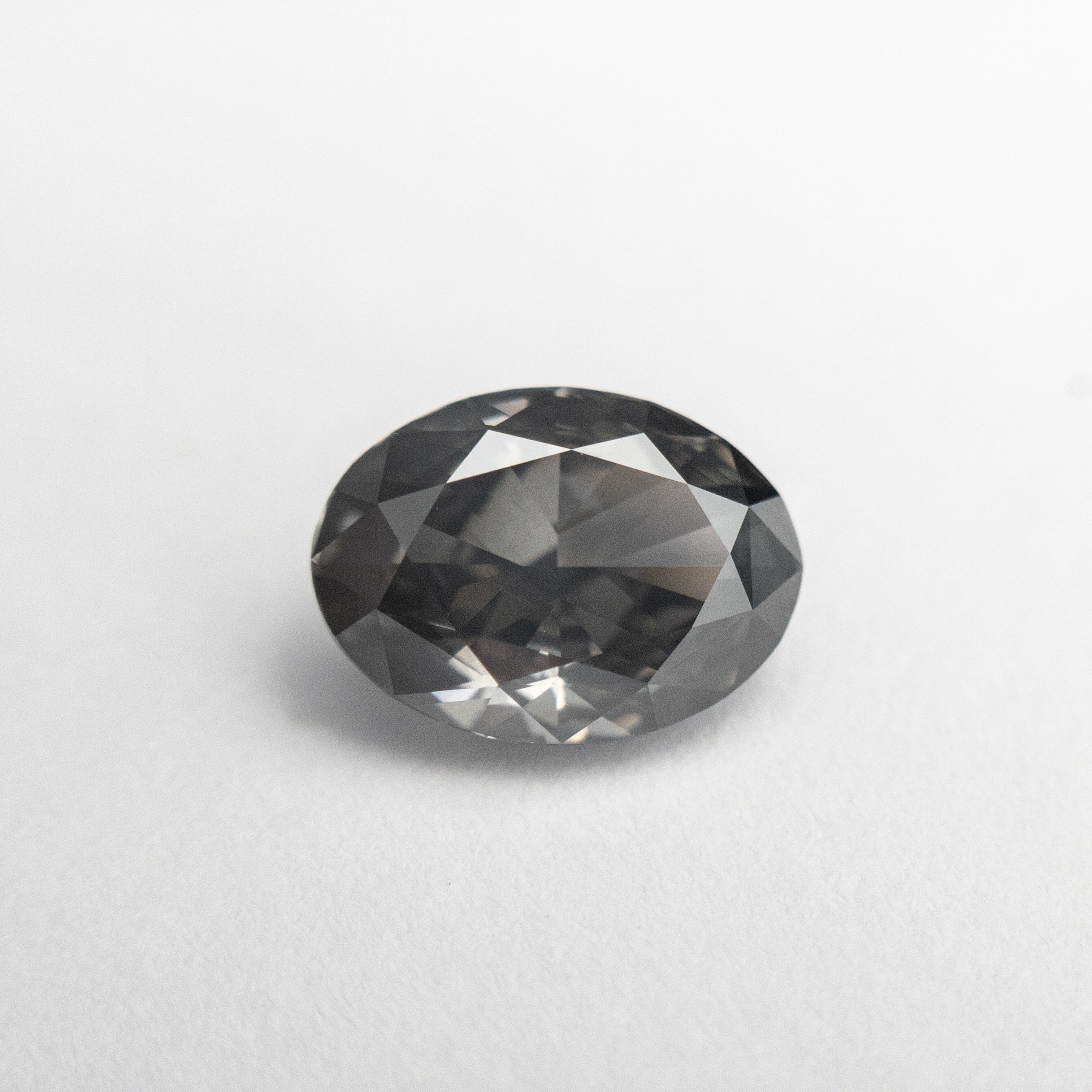 1.55ct 8.56x6.22x3.78mm GIA I1 Fancy Dark Grey Oval Brilliant 19266-01