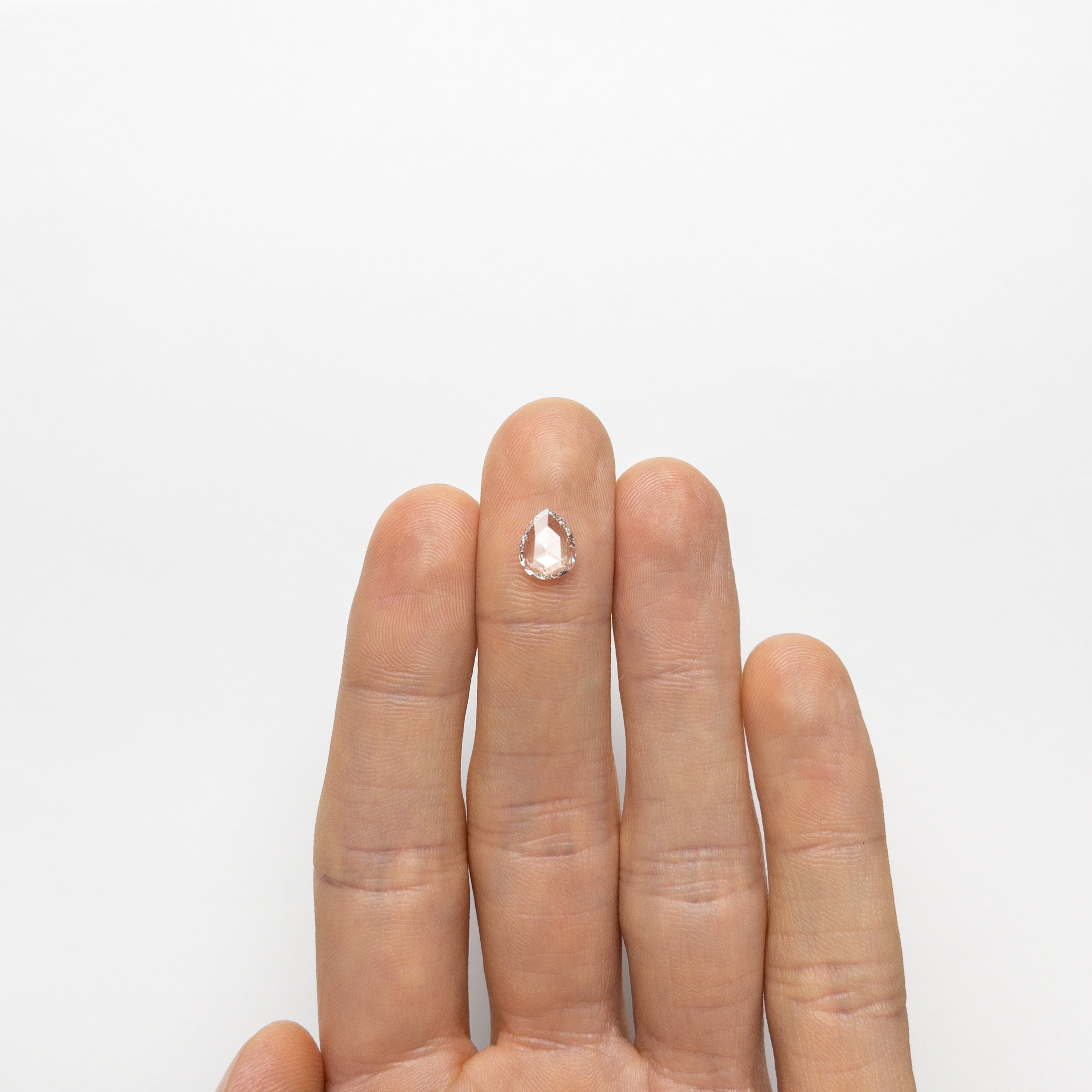 1.01ct 8.82x6.86x1.80mm SI1+ F Pear Rosecut 21940-01