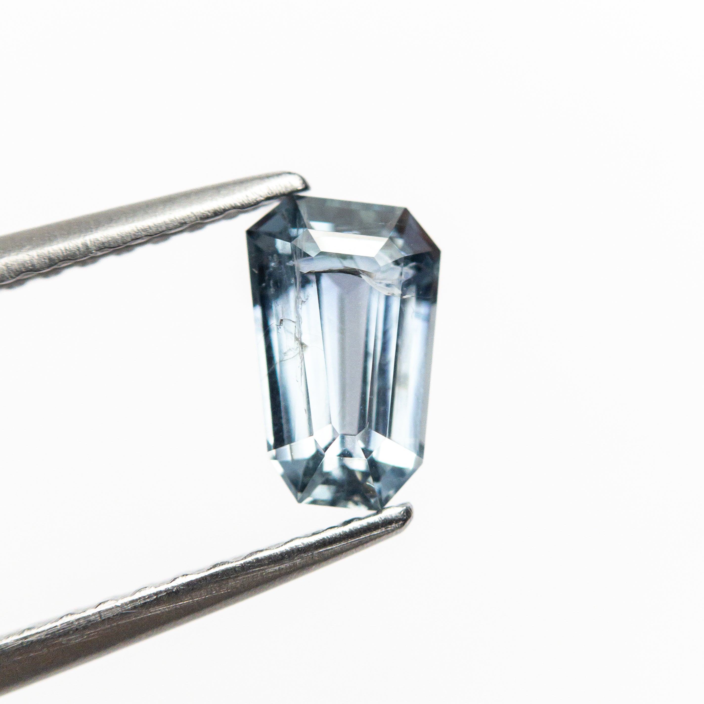 0.88ct 6.82x4.38x3.10mm Shield Step Cut Sapphire 22323-01