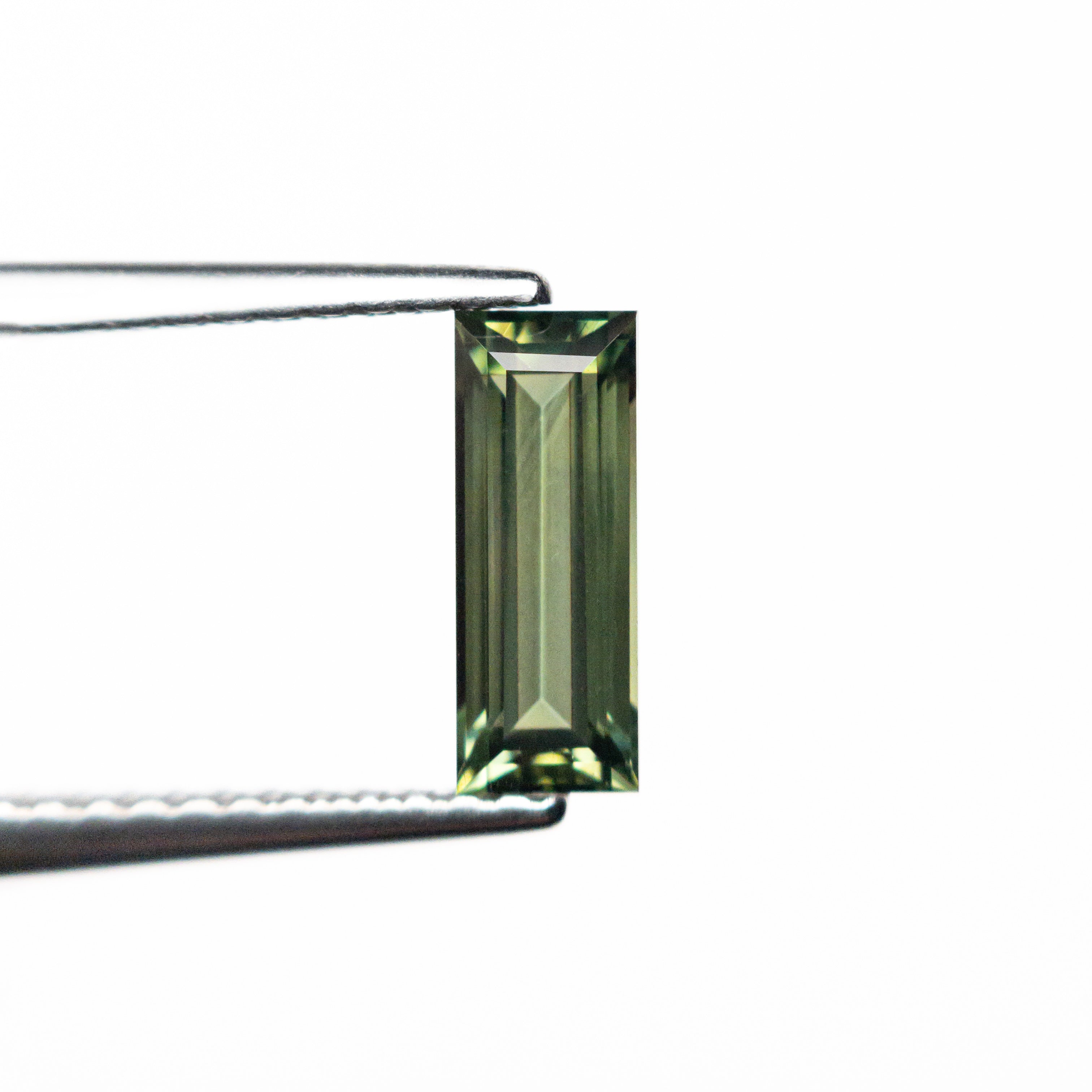 0.85ct 8.45x3.22x2.61mm Rectangle Step Cut Sapphire 25740-03