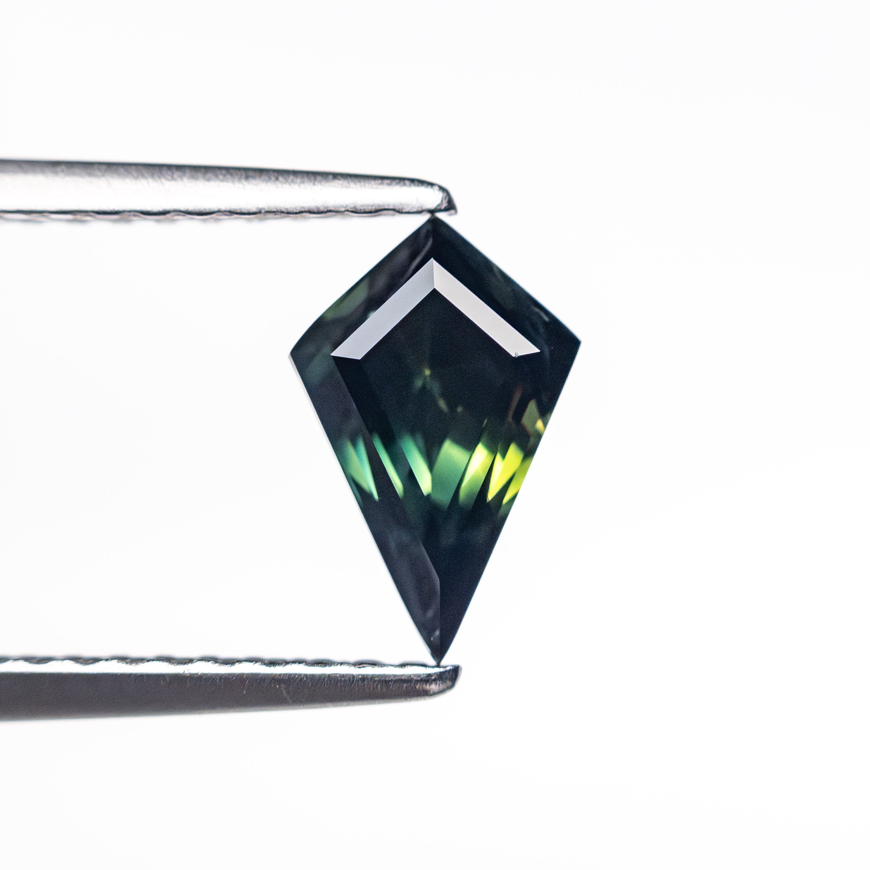 0.91ct 8.39x5.40x3.77mm Kite Step Cut Sapphire 26516-05