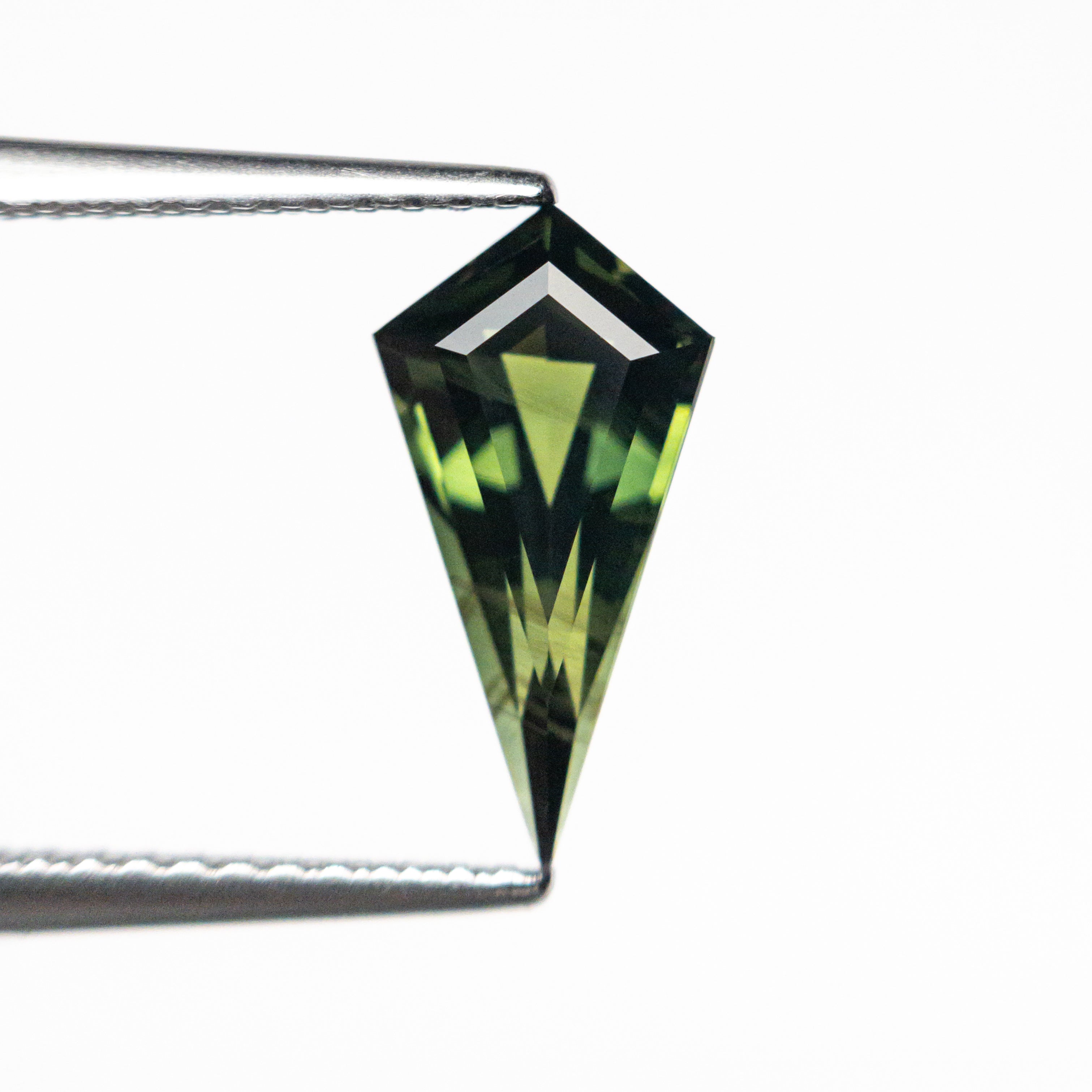 1.53ct 11.82x6.12x3.94mm Kite Step Cut Sapphire 26634-01