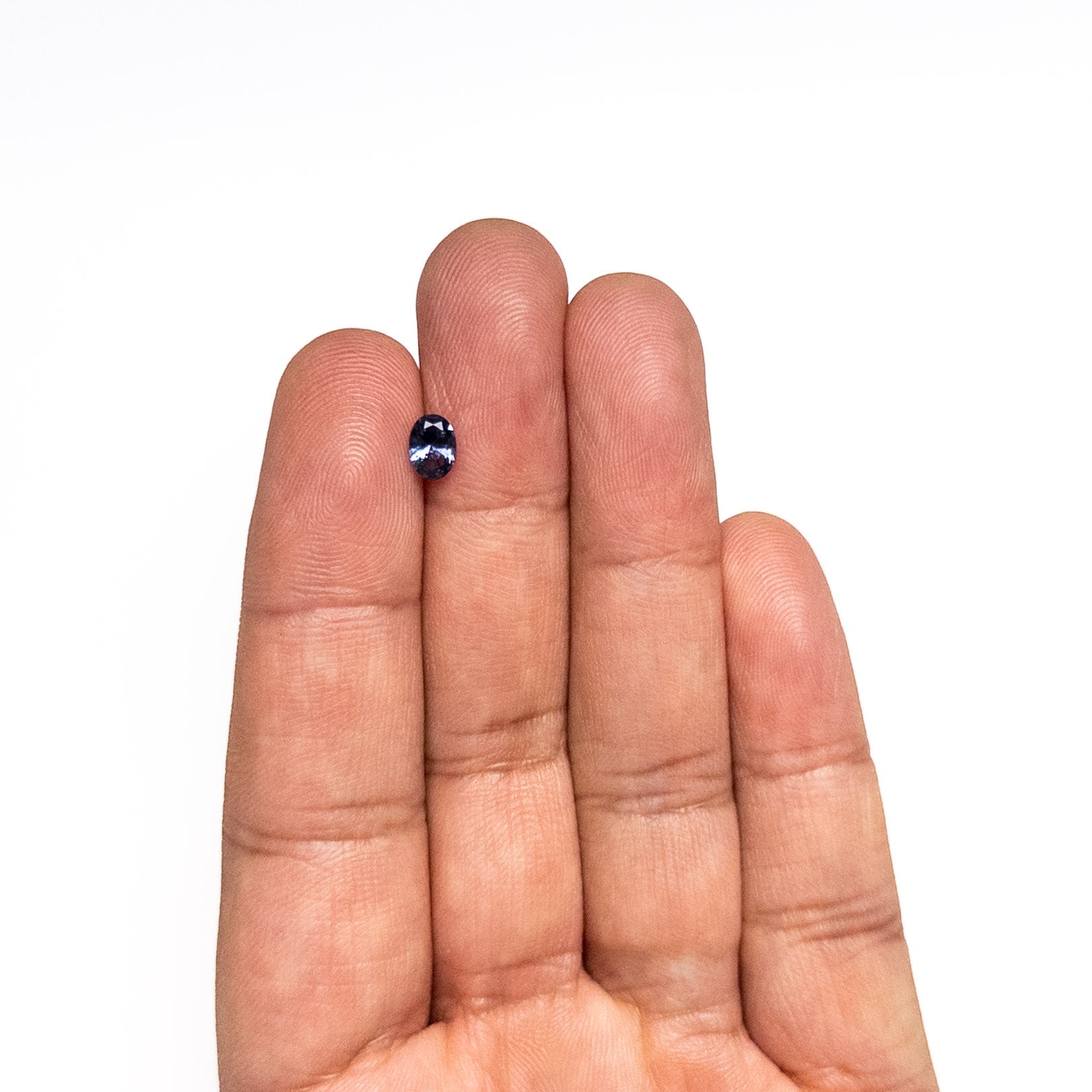 0.59ct 6.10x4.44x2.79mm Oval Brilliant Sapphire 26667-04