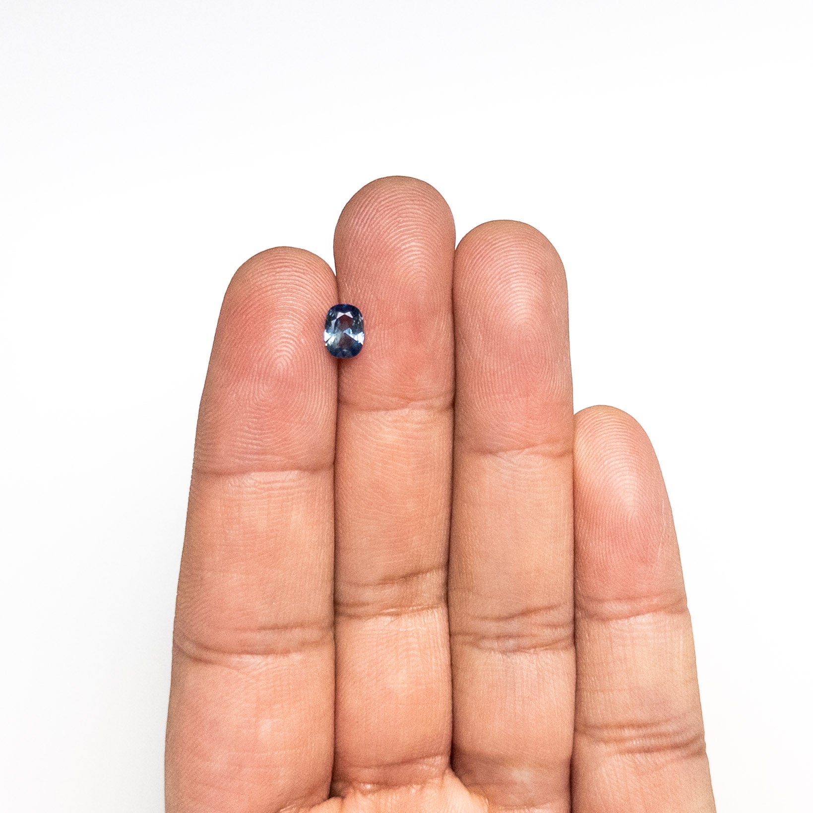 0.64ct 6.32x4.62x2.69mm Cushion Brilliant Sapphire 26673-11