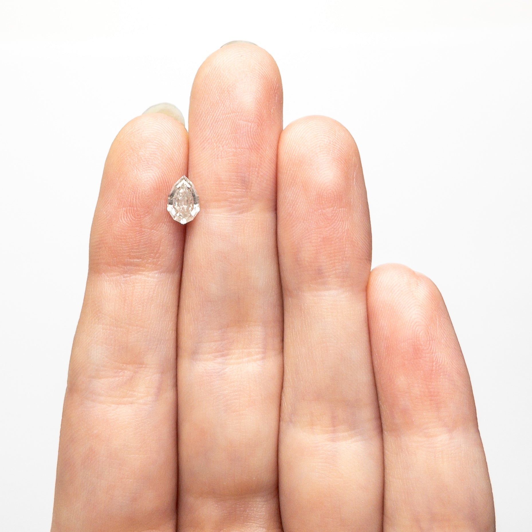 0.65ct 7.04x4.61x2.84mm Geo Pear Step Cut 🇨🇦 26846-01