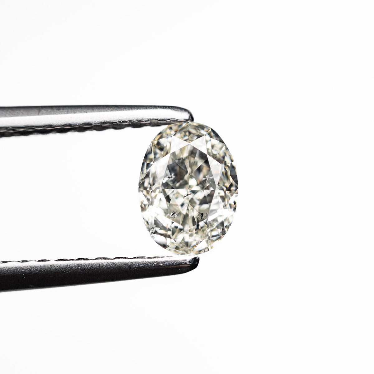 0.70ct 6.09x4.50x3.04mm SI2 K Oval Brilliant 27065-05