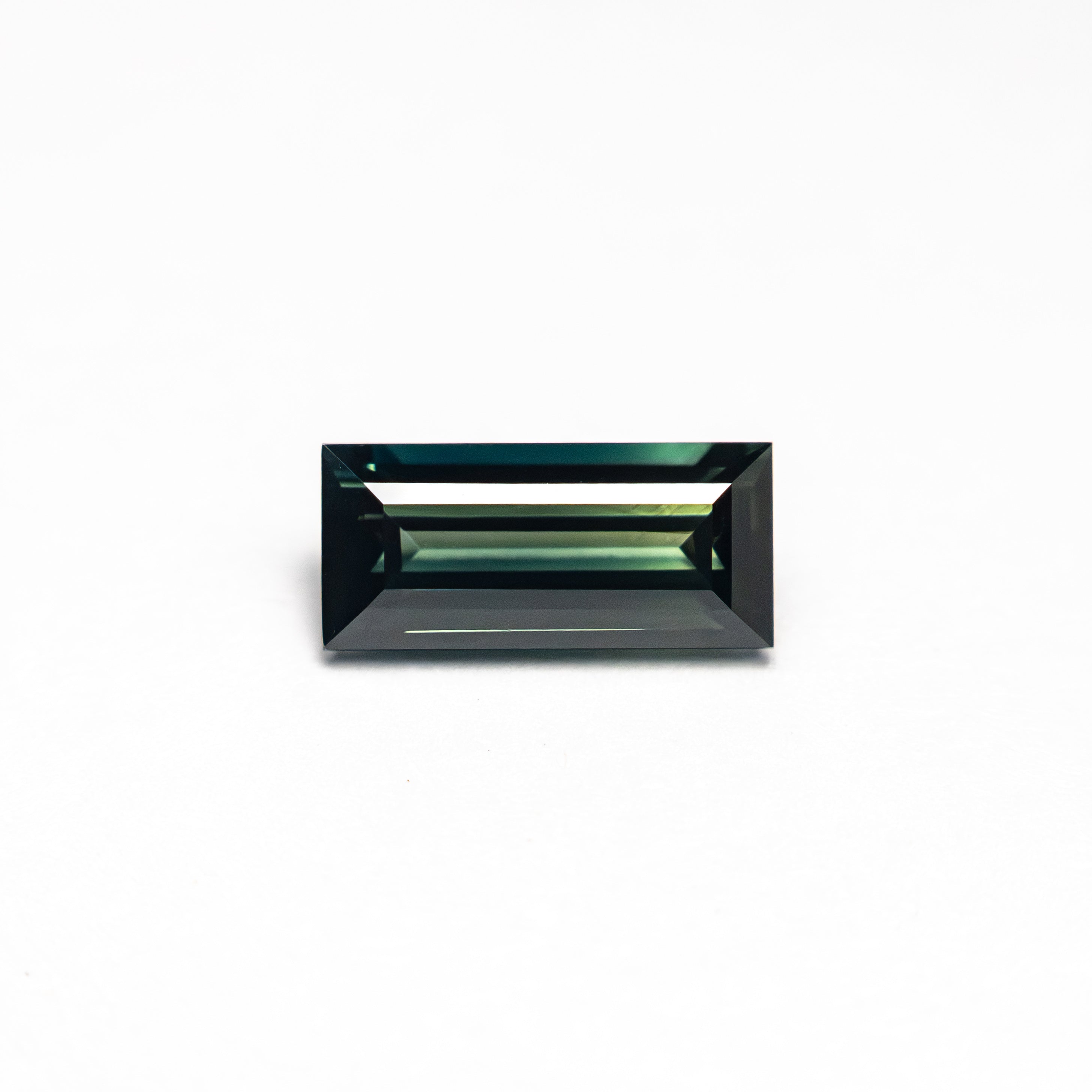 0.71ct 7.14x3.43x2.45mm Rectangle Step Cut Sapphire 27336-46