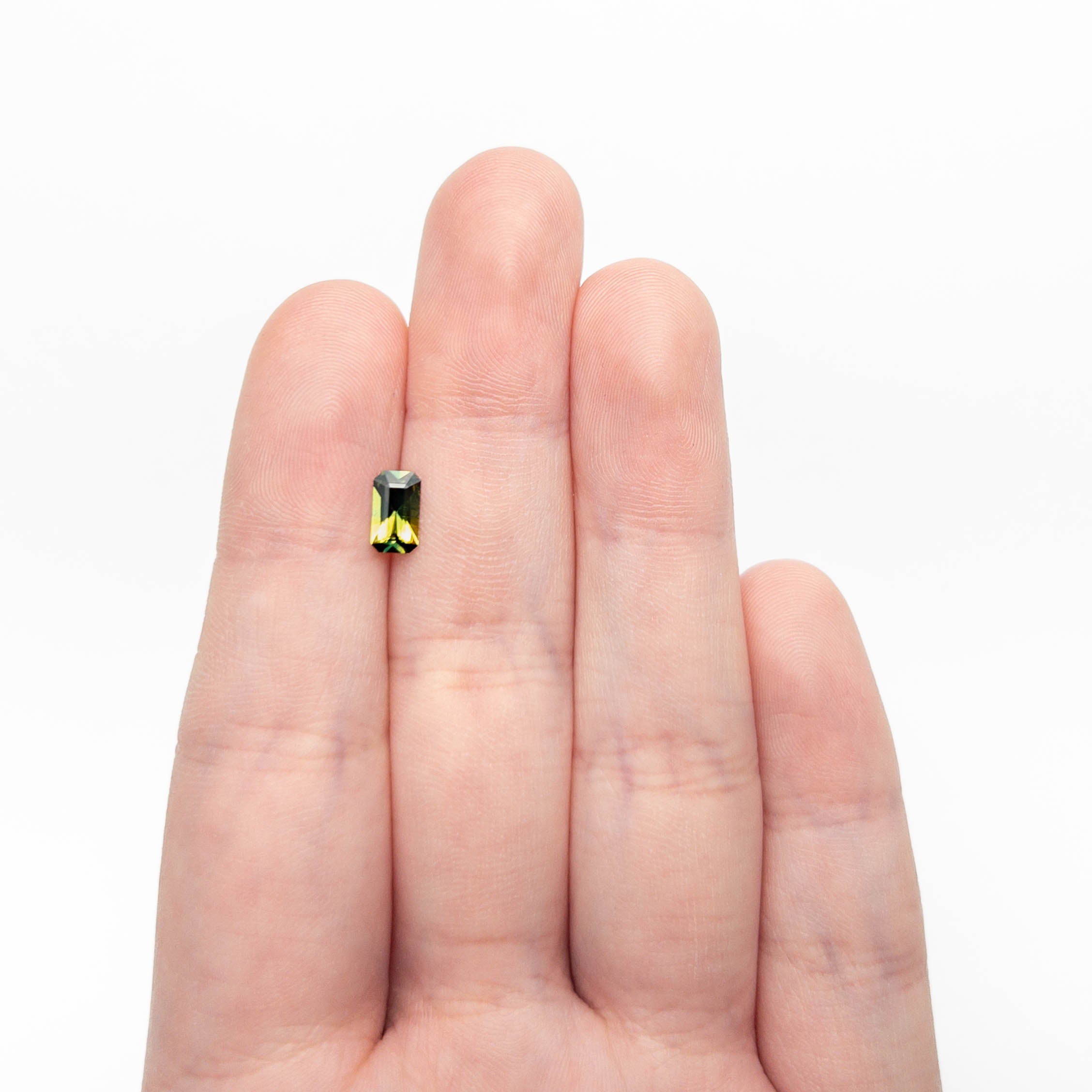 0.71ct 7.32x4.17x2.47mm Cut Corner Rectangle Step Cut Sapphire 27363-01