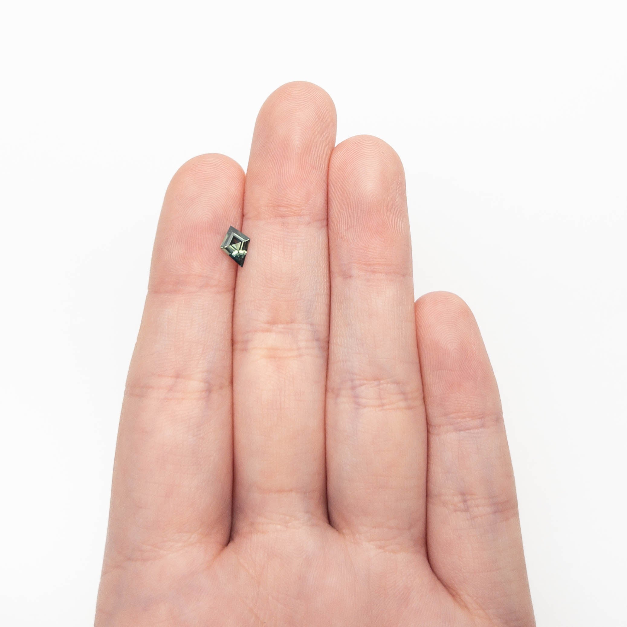 0.54ct 7.68x5.44x2.64mm Kite Step Cut Sapphire 27363-14