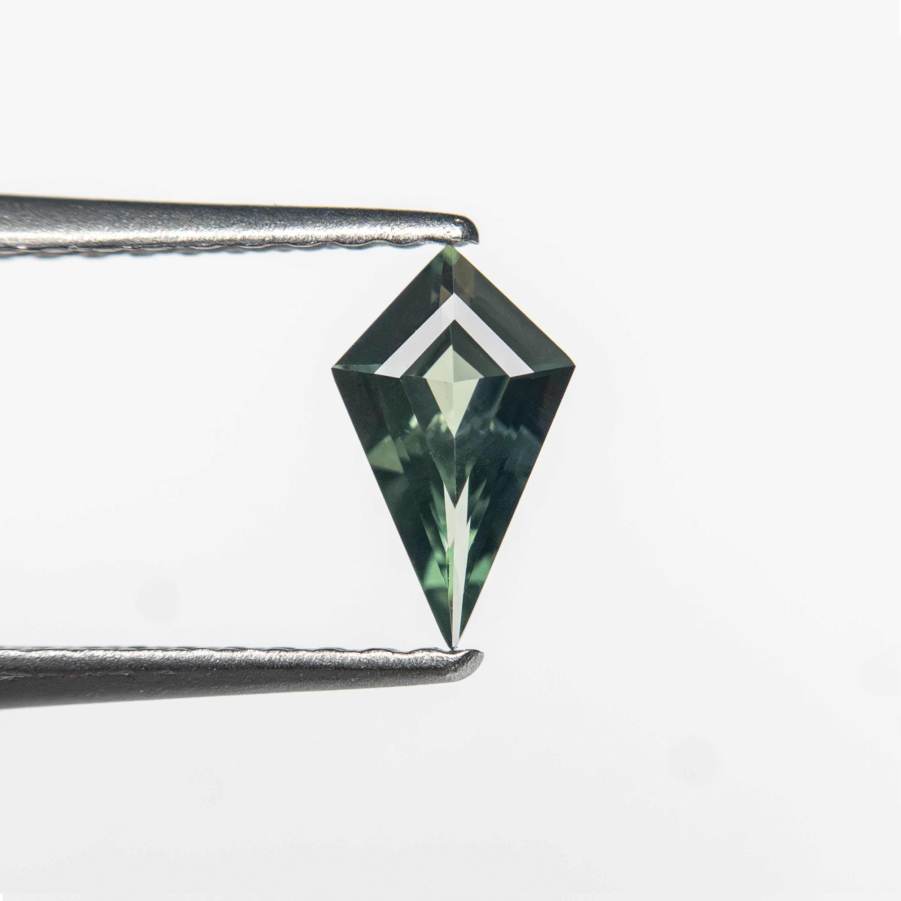 0.27ct 7.04x4.23x1.92mm Kite Step Cut Sapphire 27363-17