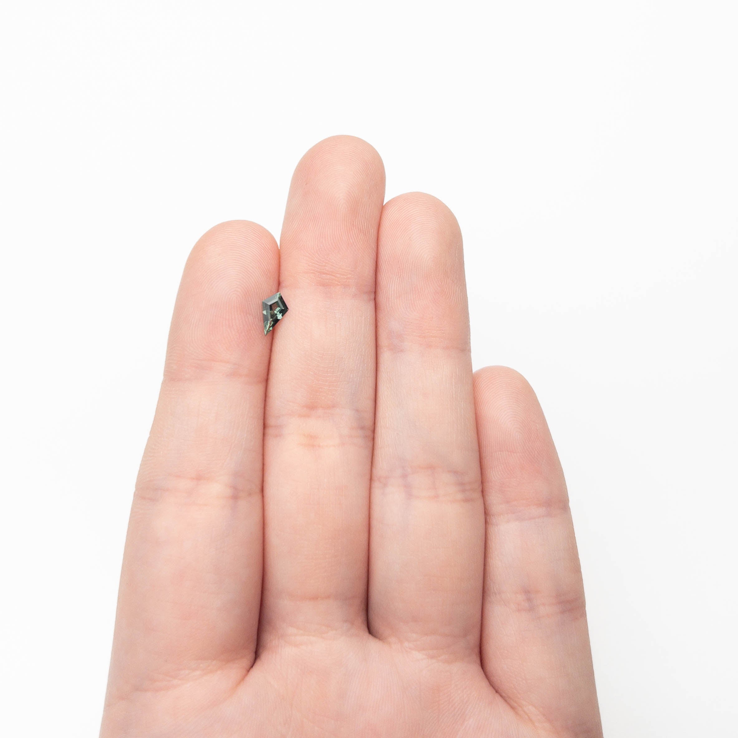 0.27ct 7.04x4.23x1.92mm Kite Step Cut Sapphire 27363-17