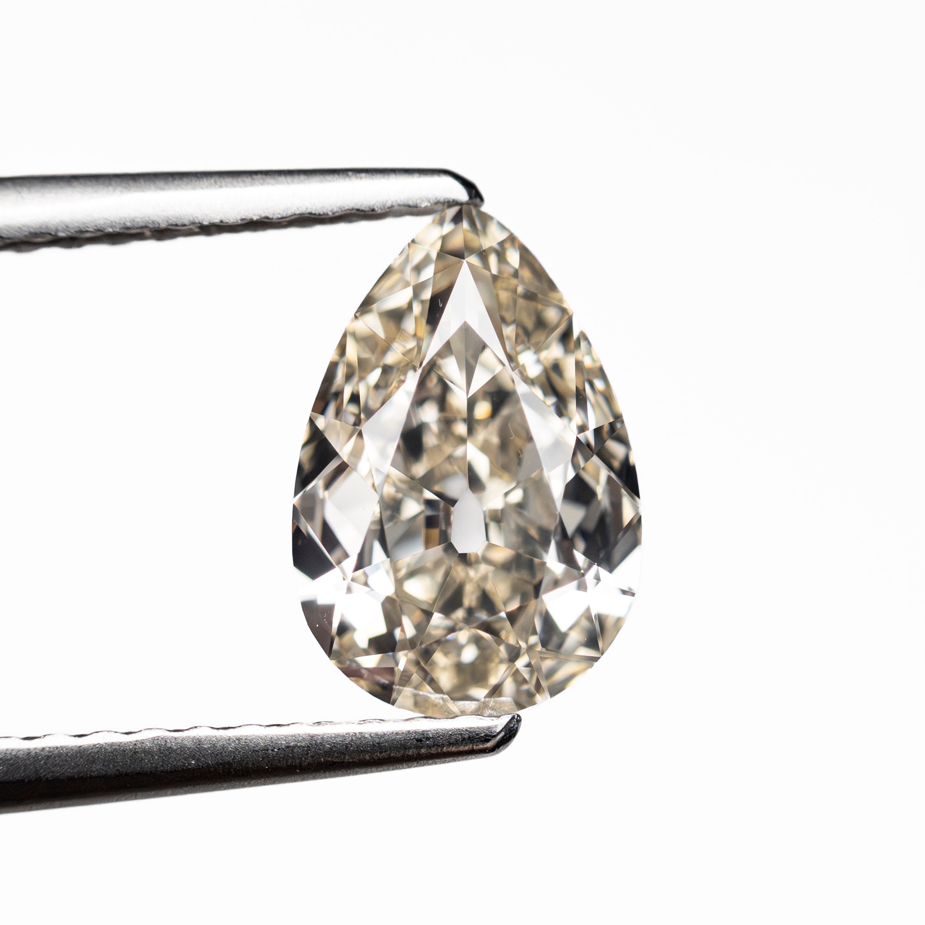 1.28ct 9.24x6.28x3.17mm GIA VVS2 M Pear Brilliant 28021-01
