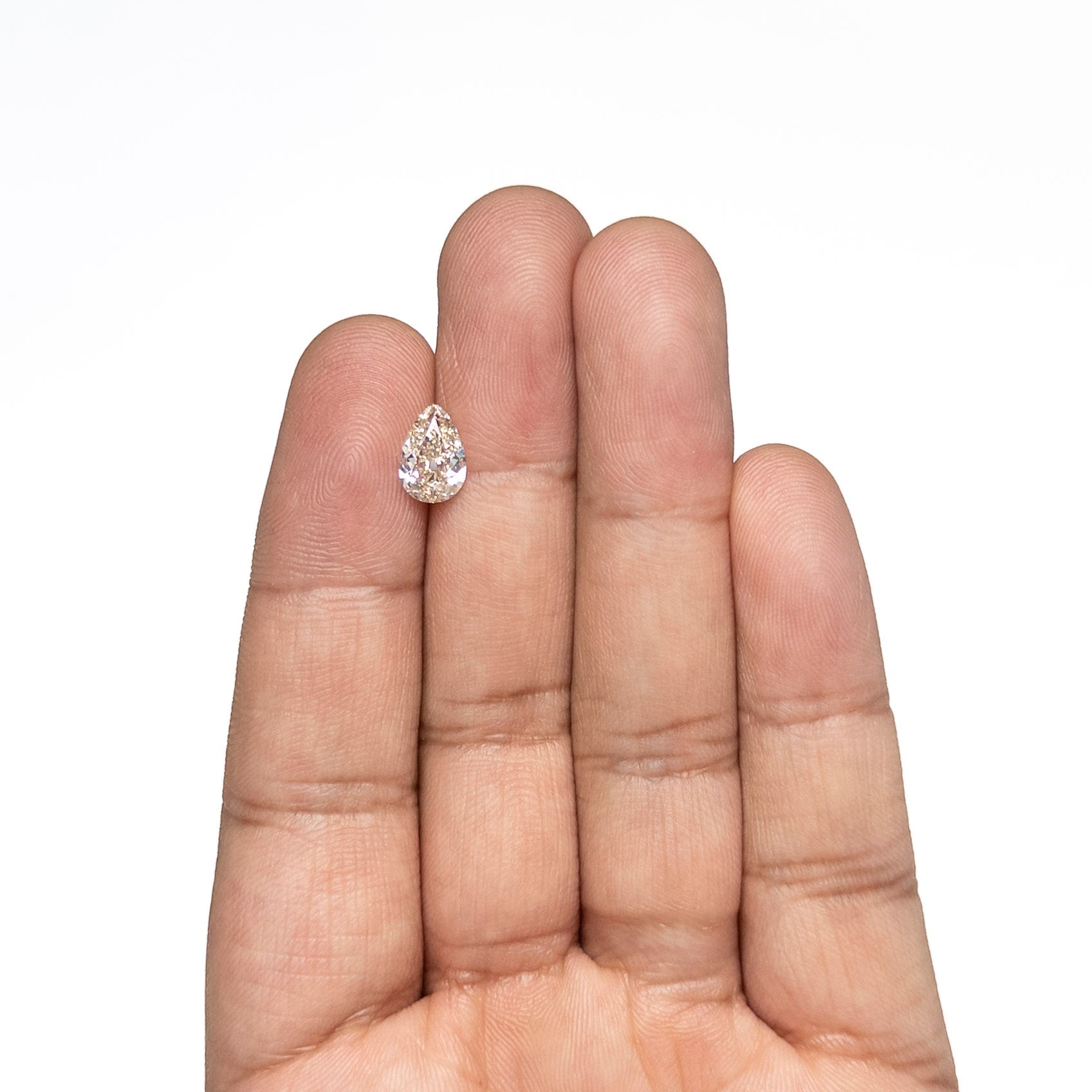 1.28ct 9.24x6.28x3.17mm GIA VVS2 M Pear Brilliant 28021-01
