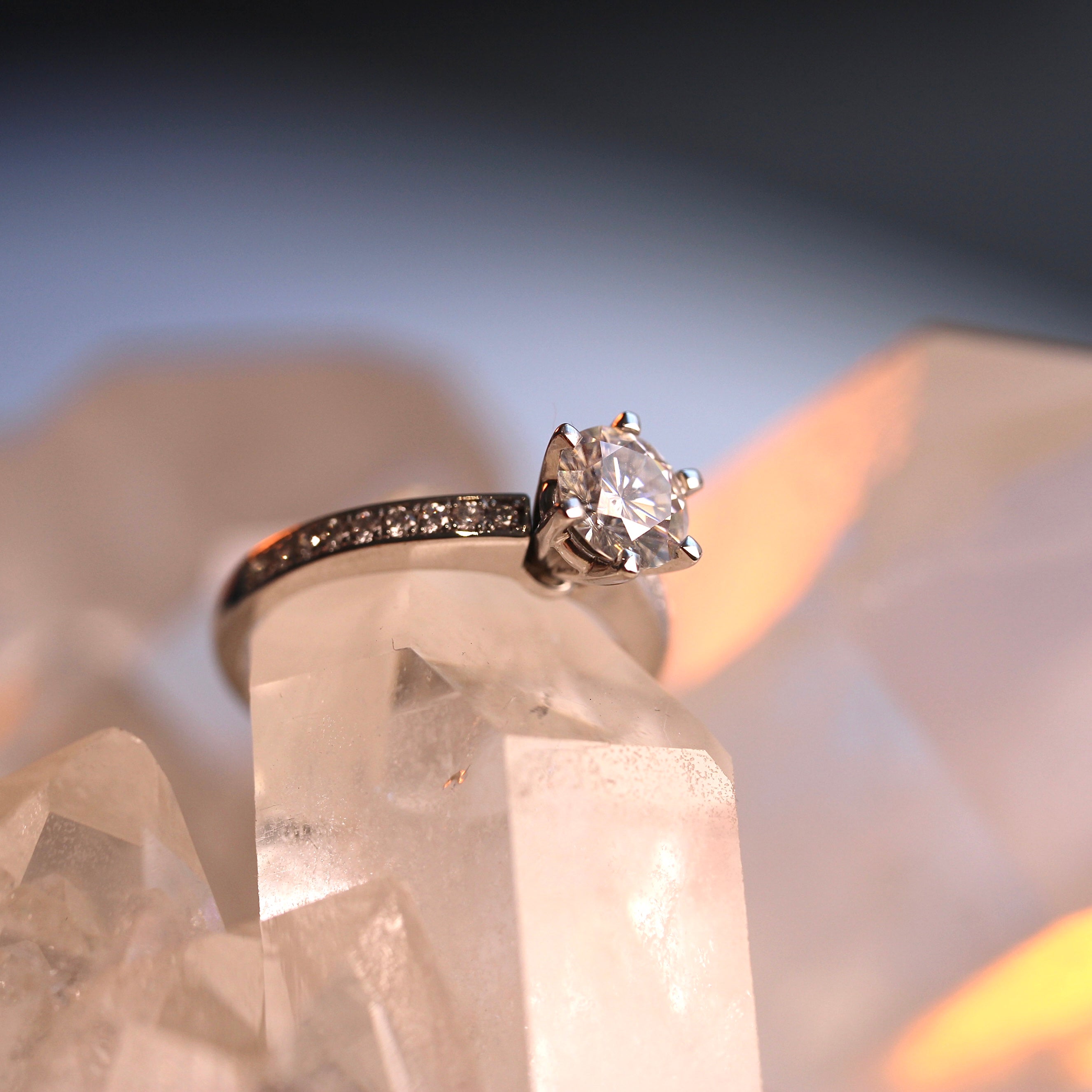 lab created diamondwhite gold solitaire with white diamonds on the shoulders