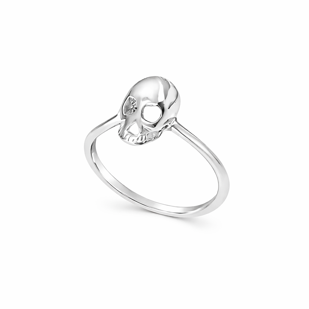 Silver skull ring on a white background