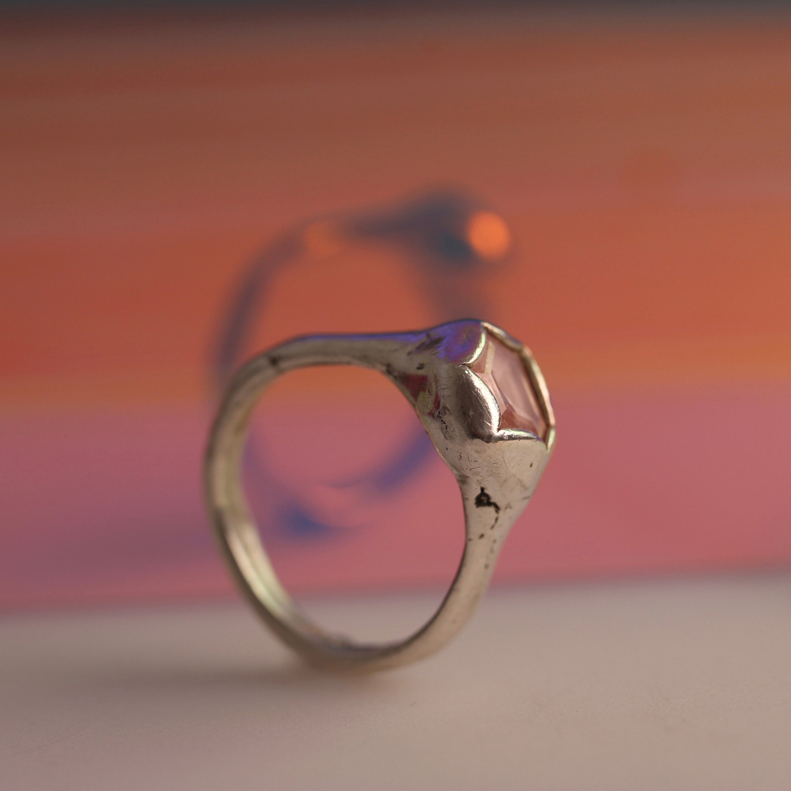 organic blob style ring with pink geometrical sapphire