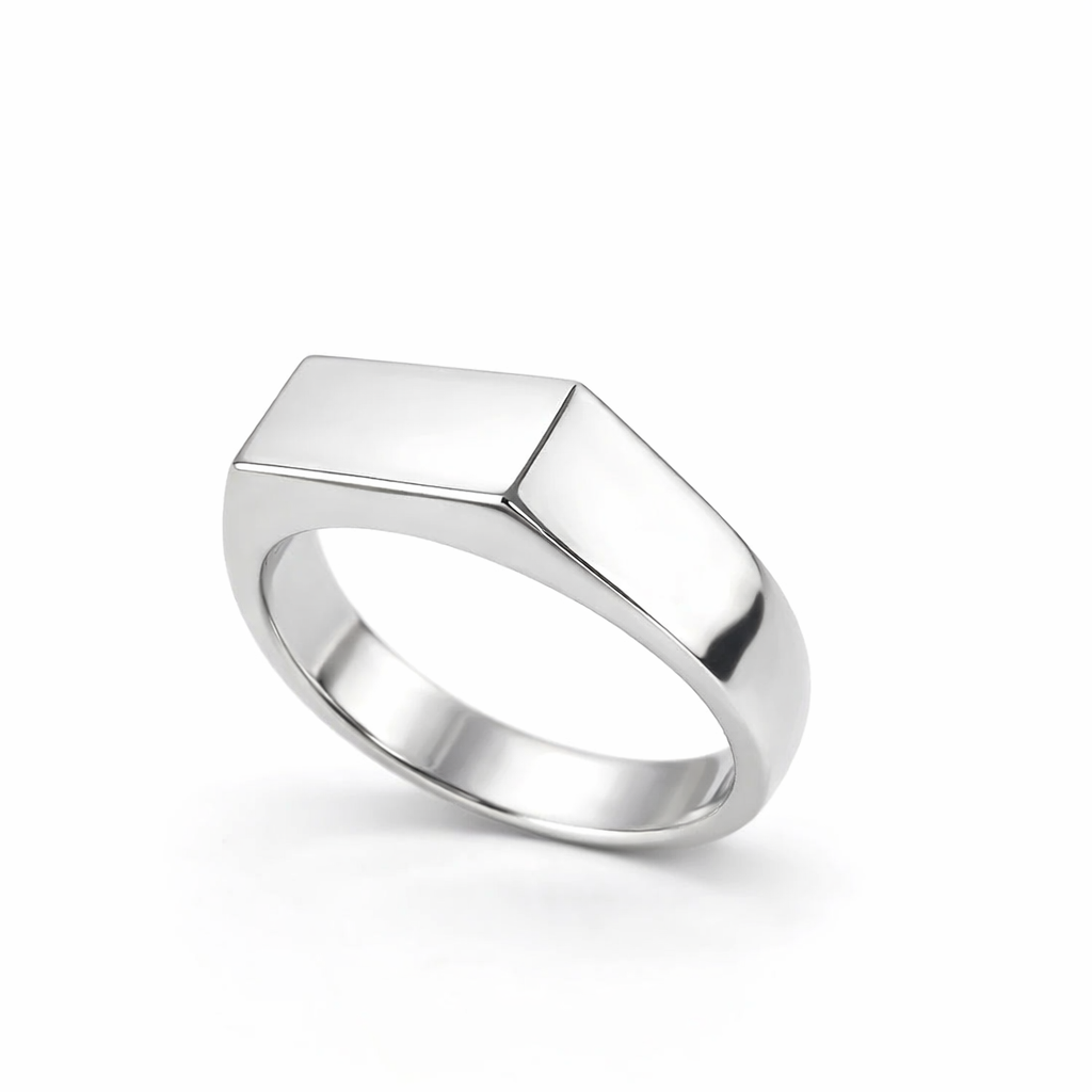 rectangle shaped signet Silver ring with a geometric design on a white background