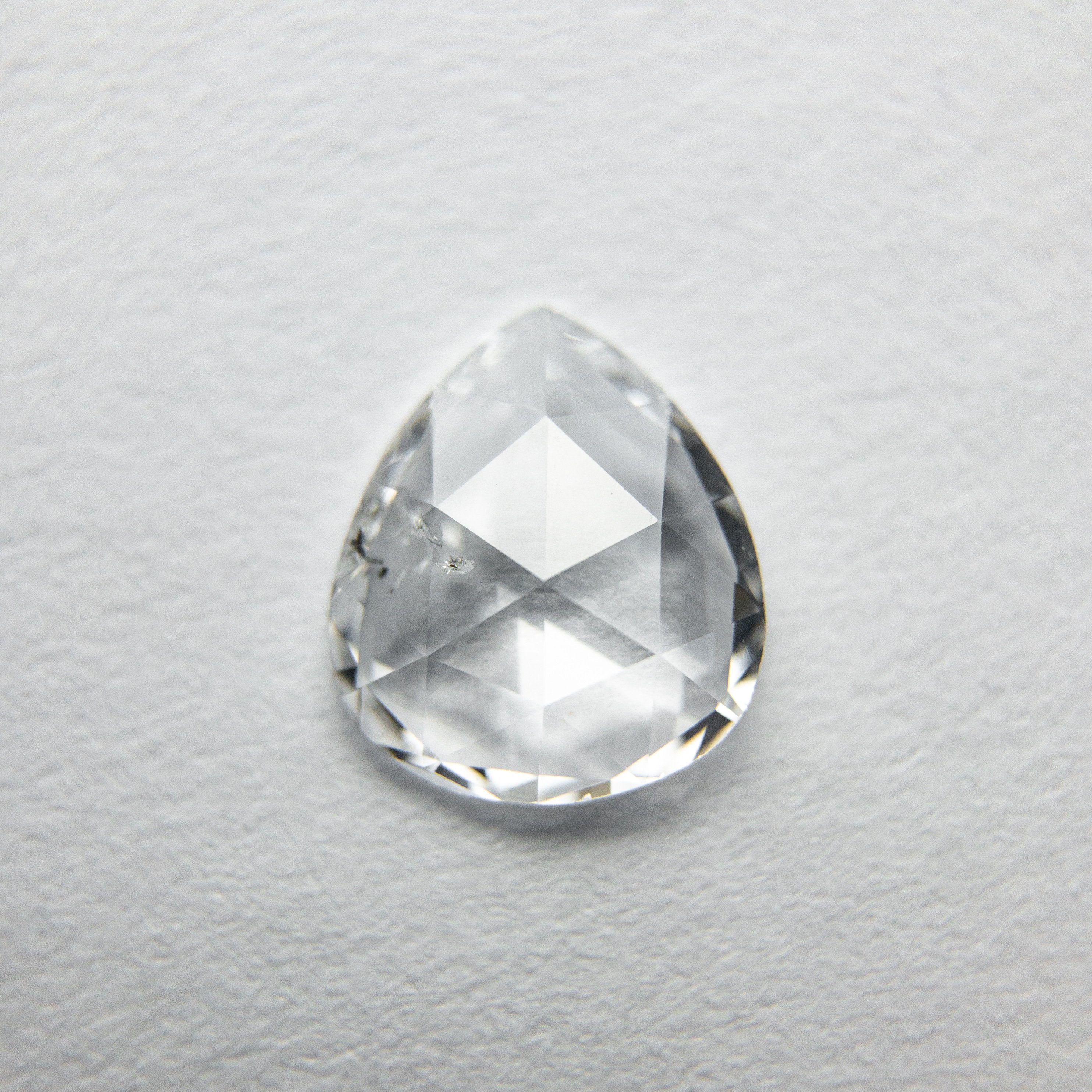 0.65ct 7.29x6.33x1.81mm Pear Rosecut 18050-03 hold d963