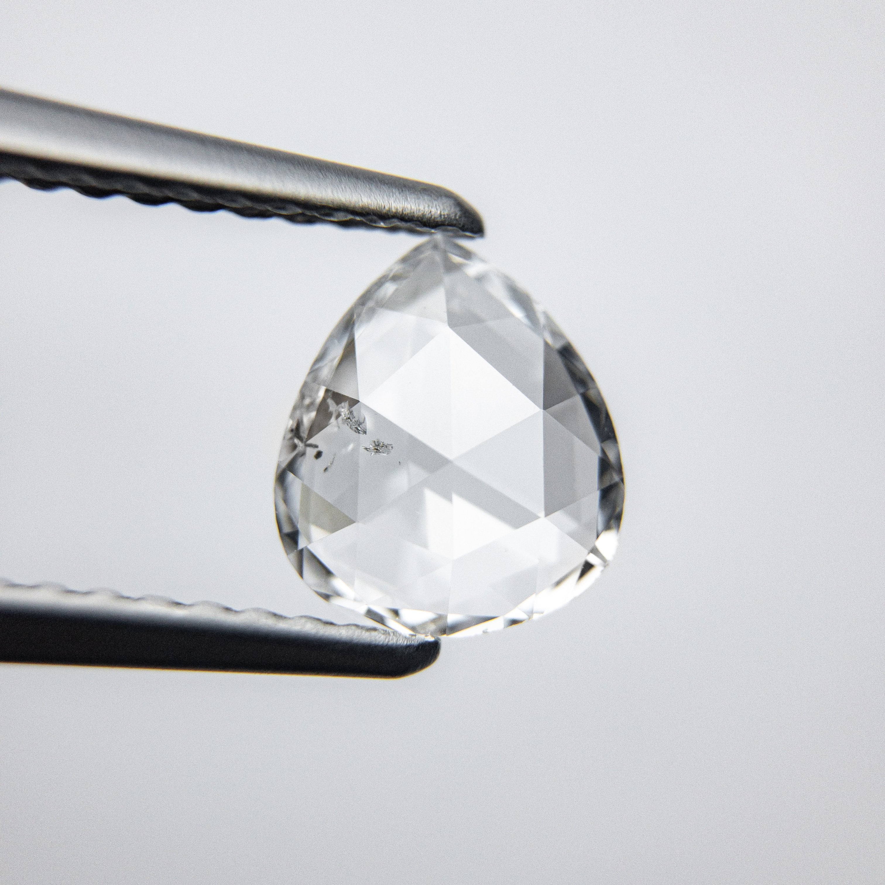 0.65ct 7.29x6.33x1.81mm Pear Rosecut 18050-03 hold d963