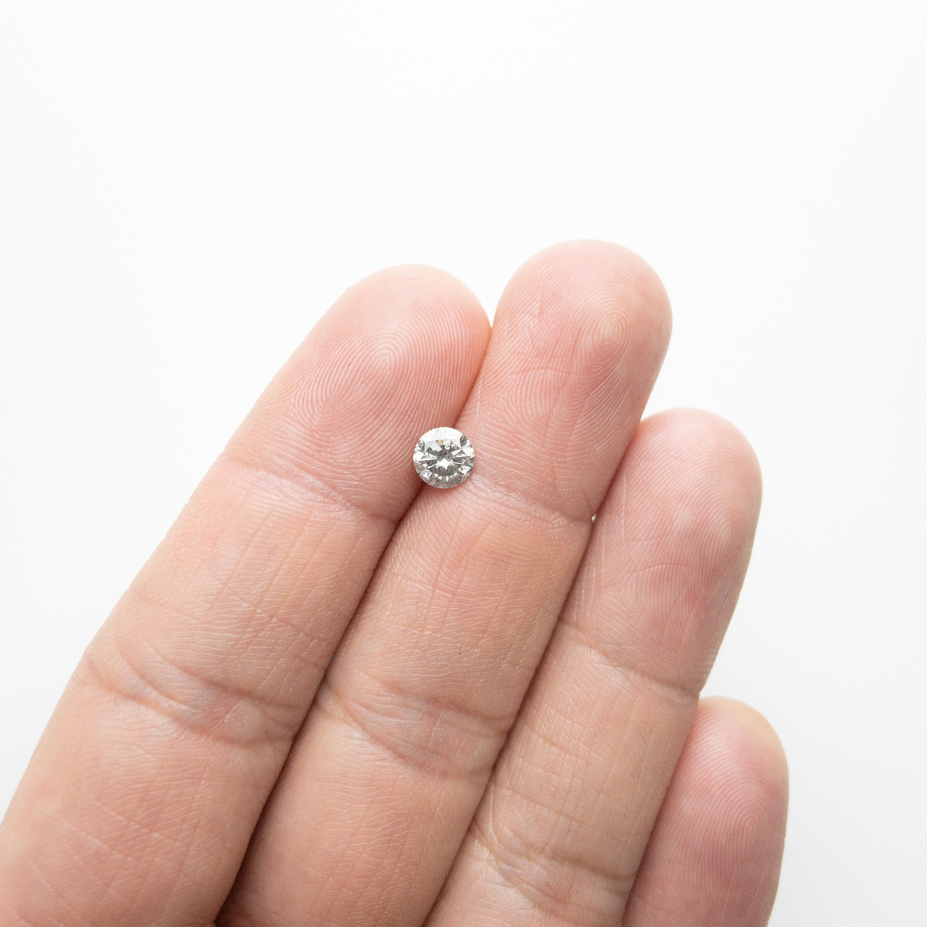 0.69ct 5.66x5.61x3.35mm Round Brilliant 18118-16