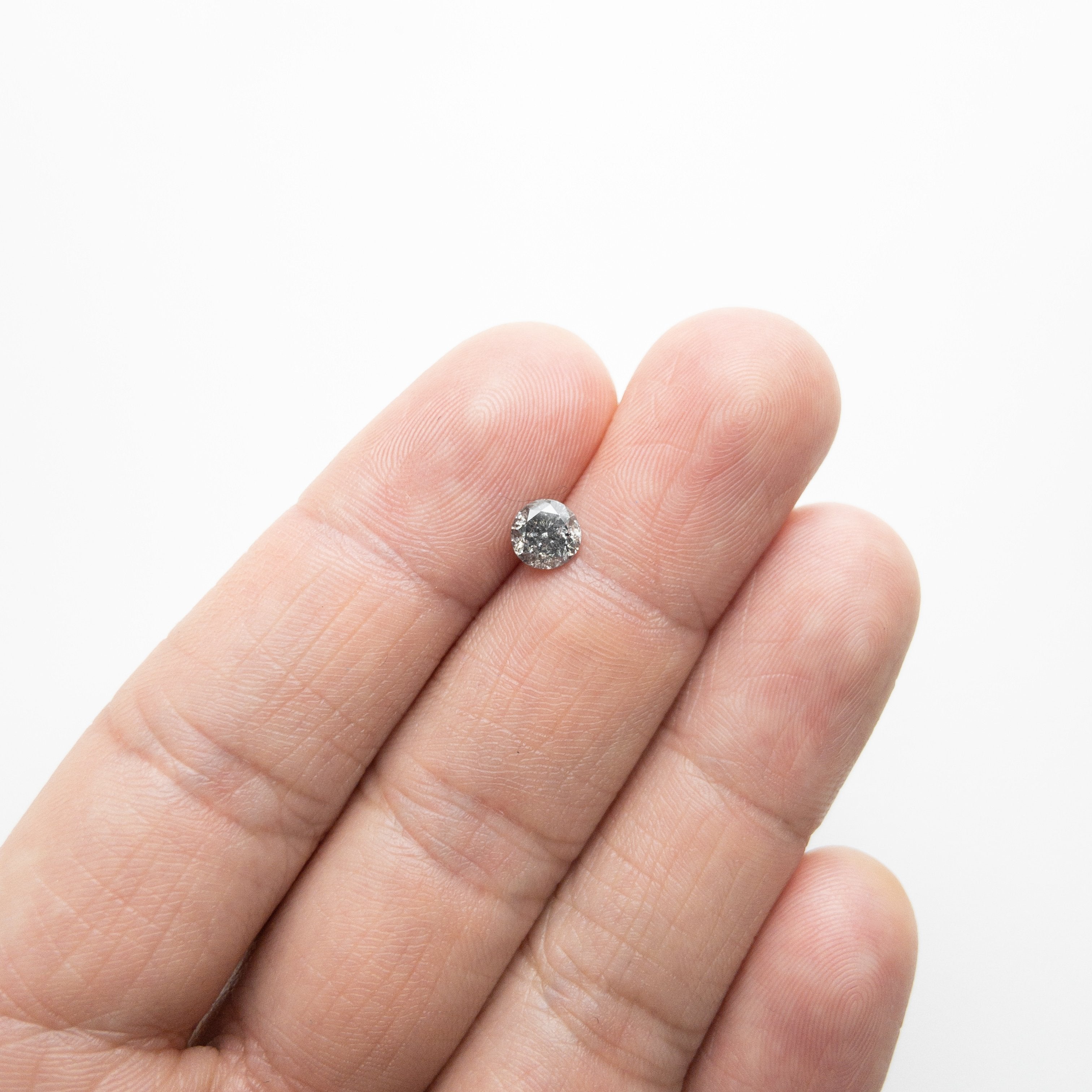 0.77ct 5.63x5.60x3.54mm Round Brilliant 18118-20