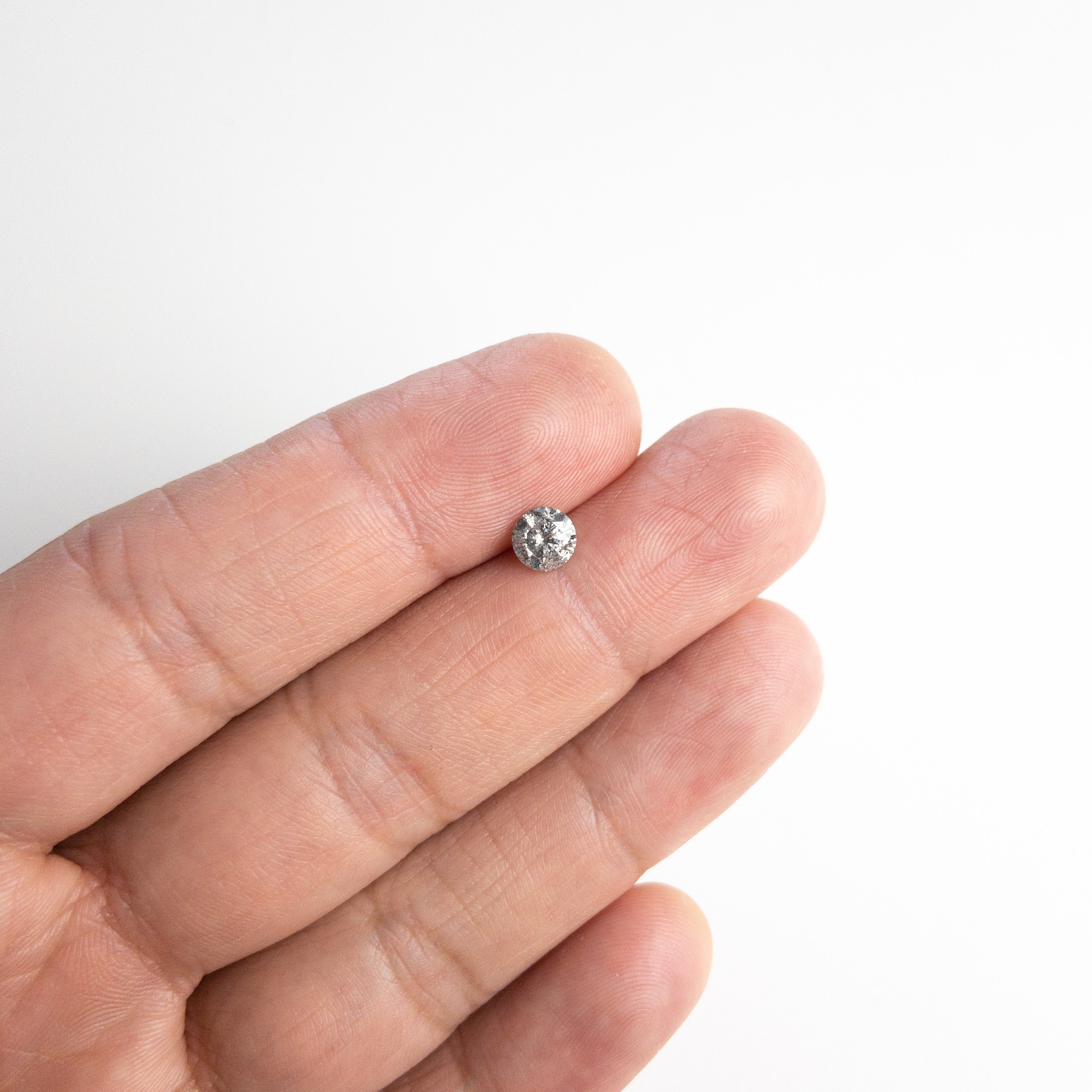 0.71ct 5.65x5.62x3.43mm Round Brilliant 18118-24 HOLD