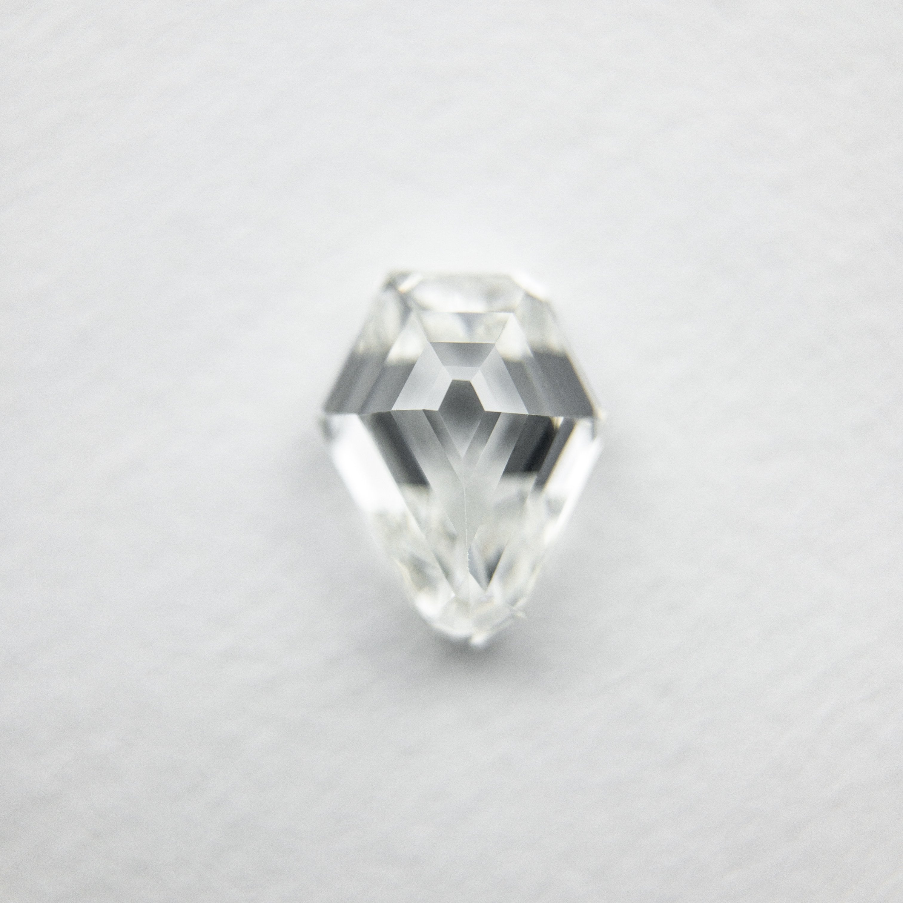 0.79ct 6.73x5.32x3.04mm Shield Step Cut 18129-07 HOLD D151