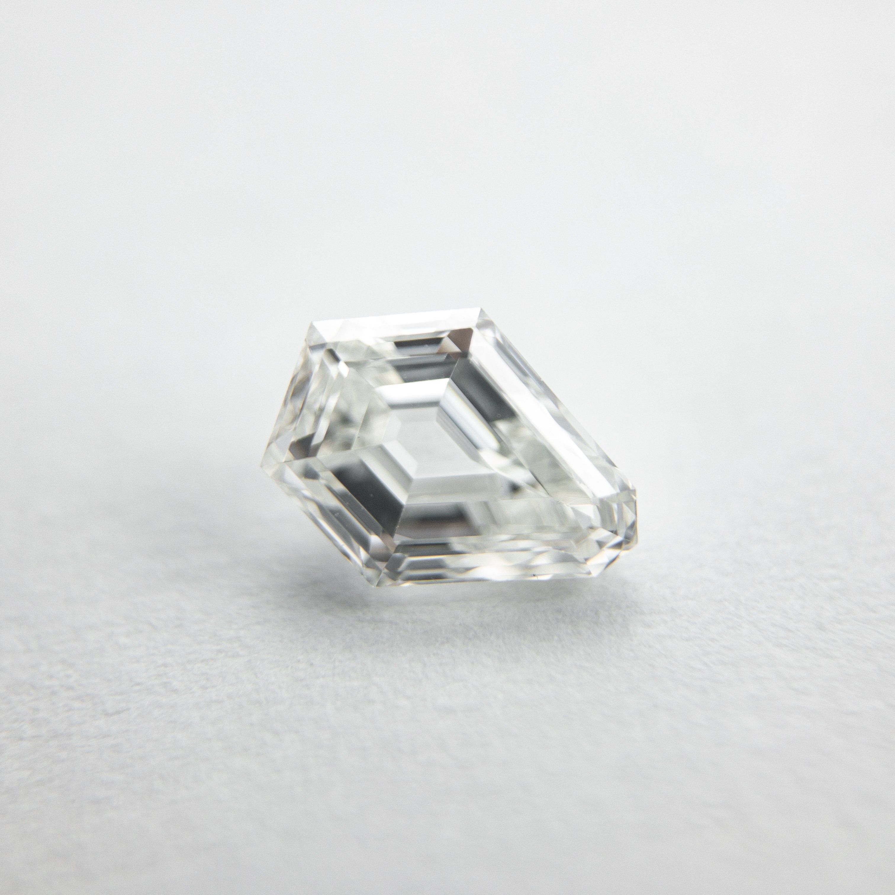 0.79ct 6.73x5.32x3.04mm Shield Step Cut 18129-07 HOLD D151