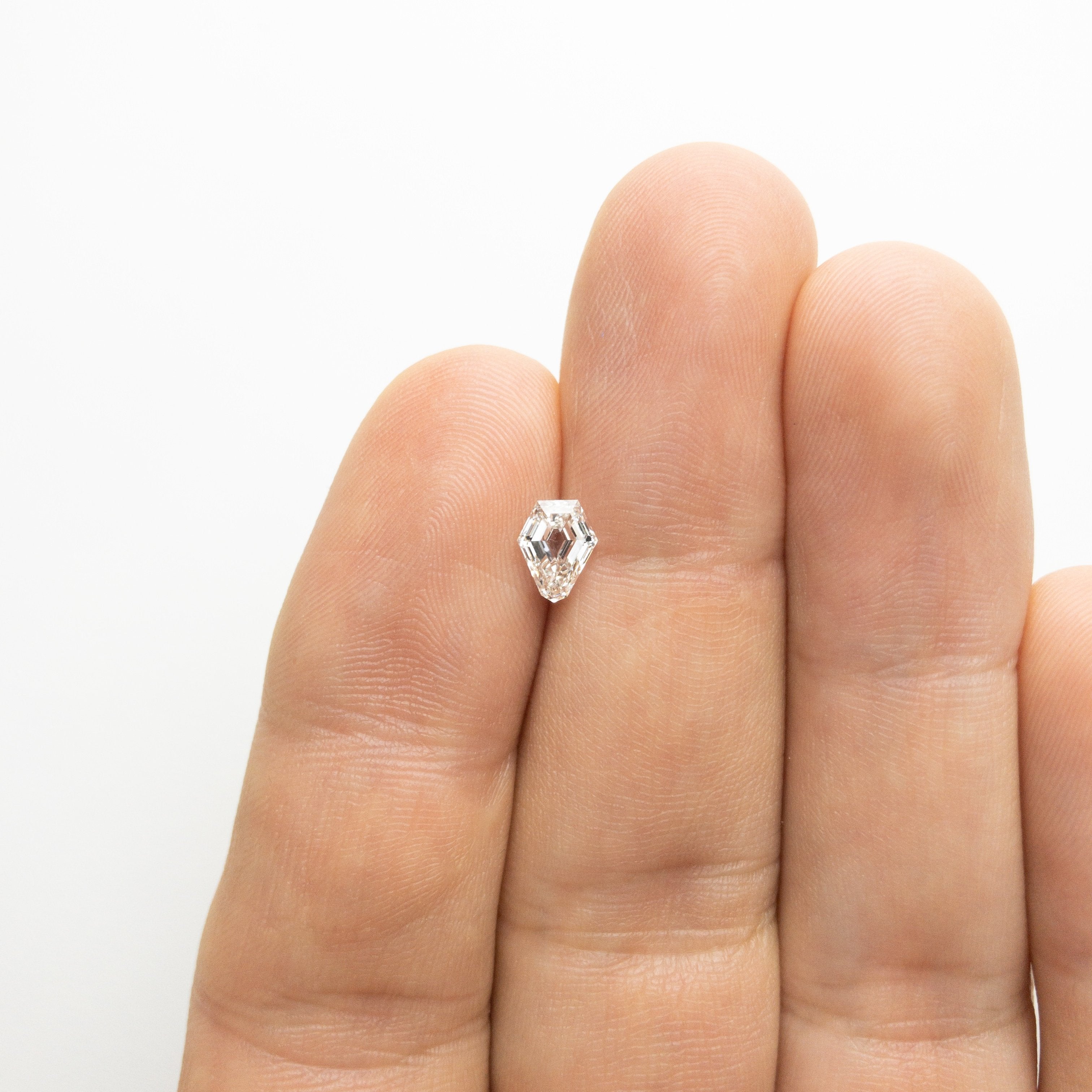 0.79ct 6.73x5.32x3.04mm Shield Step Cut 18129-07 HOLD D151
