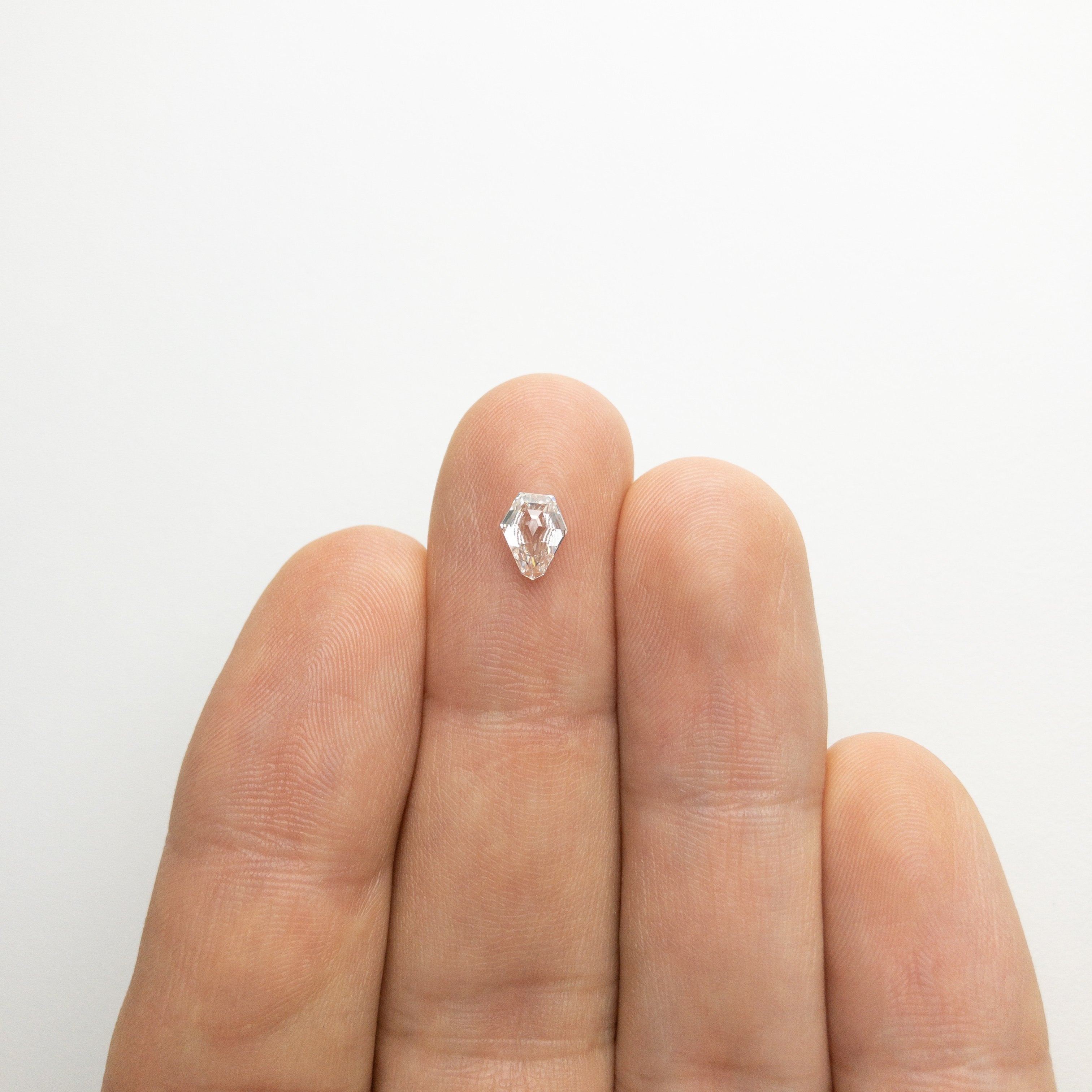 0.79ct 6.73x5.32x3.04mm Shield Step Cut 18129-07 HOLD D151
