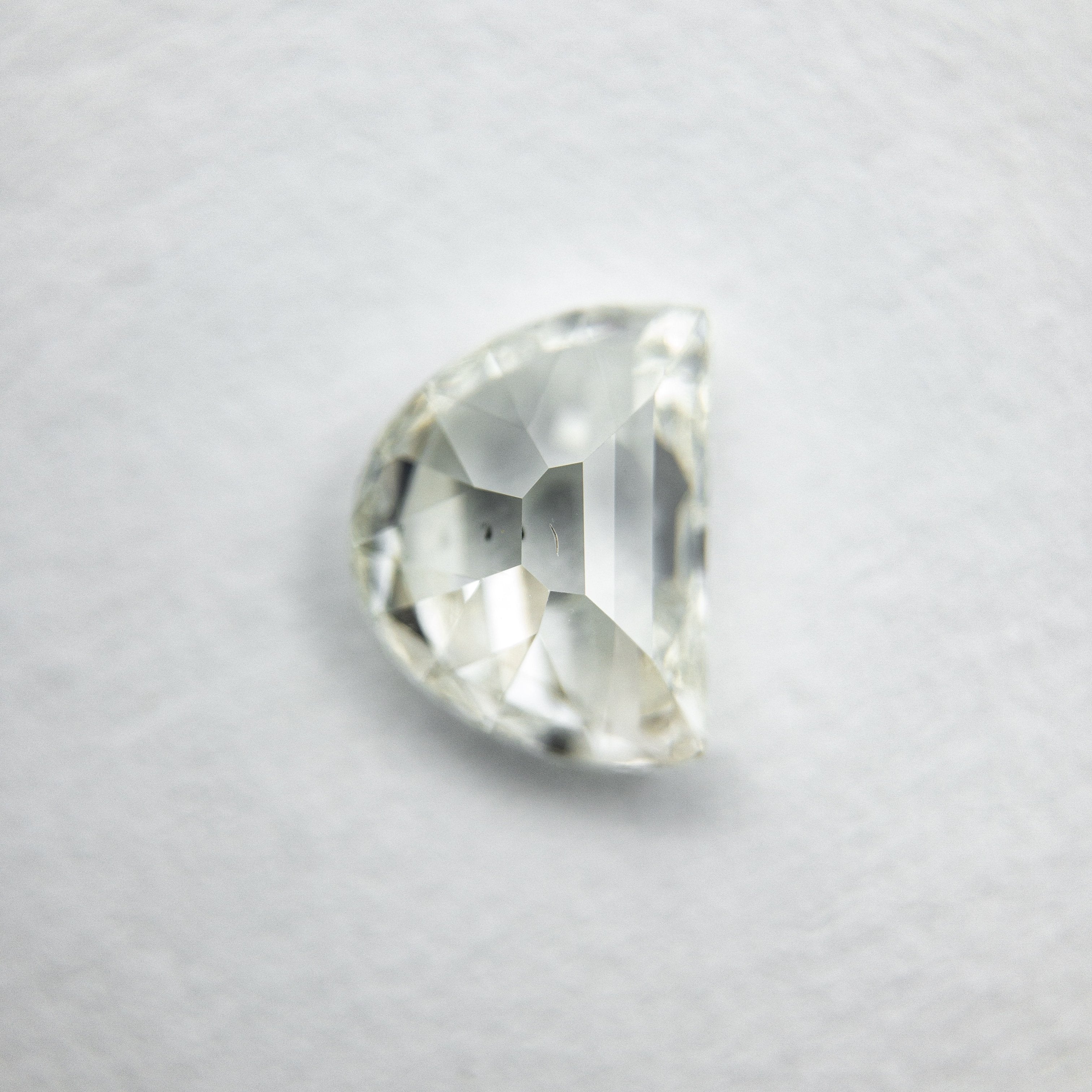 0.85ct 6.99x5.39x2.71mm Half Moon Modern Antique Cut 18129-10 hold D1425