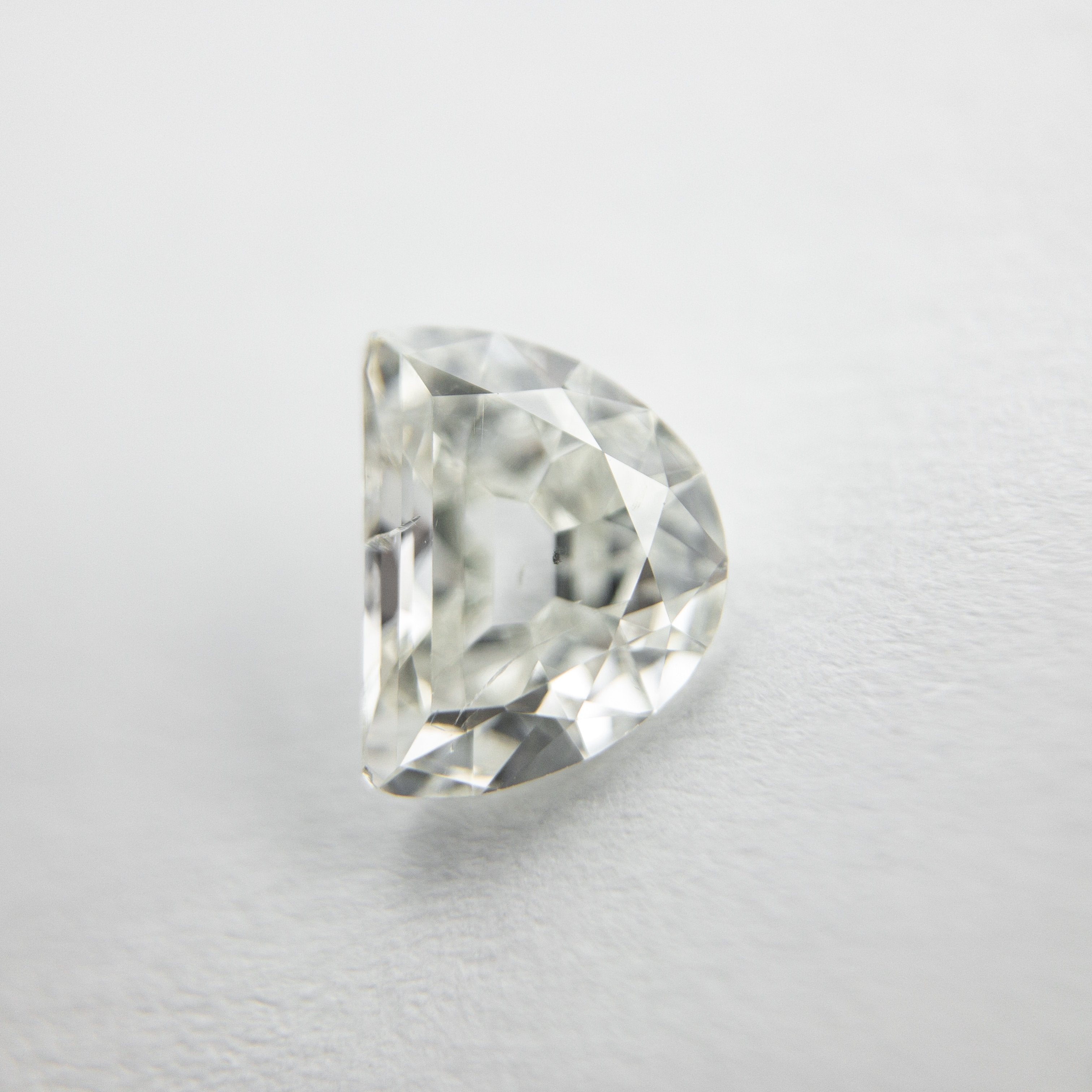 0.85ct 6.99x5.39x2.71mm Half Moon Modern Antique Cut 18129-10 hold D1425