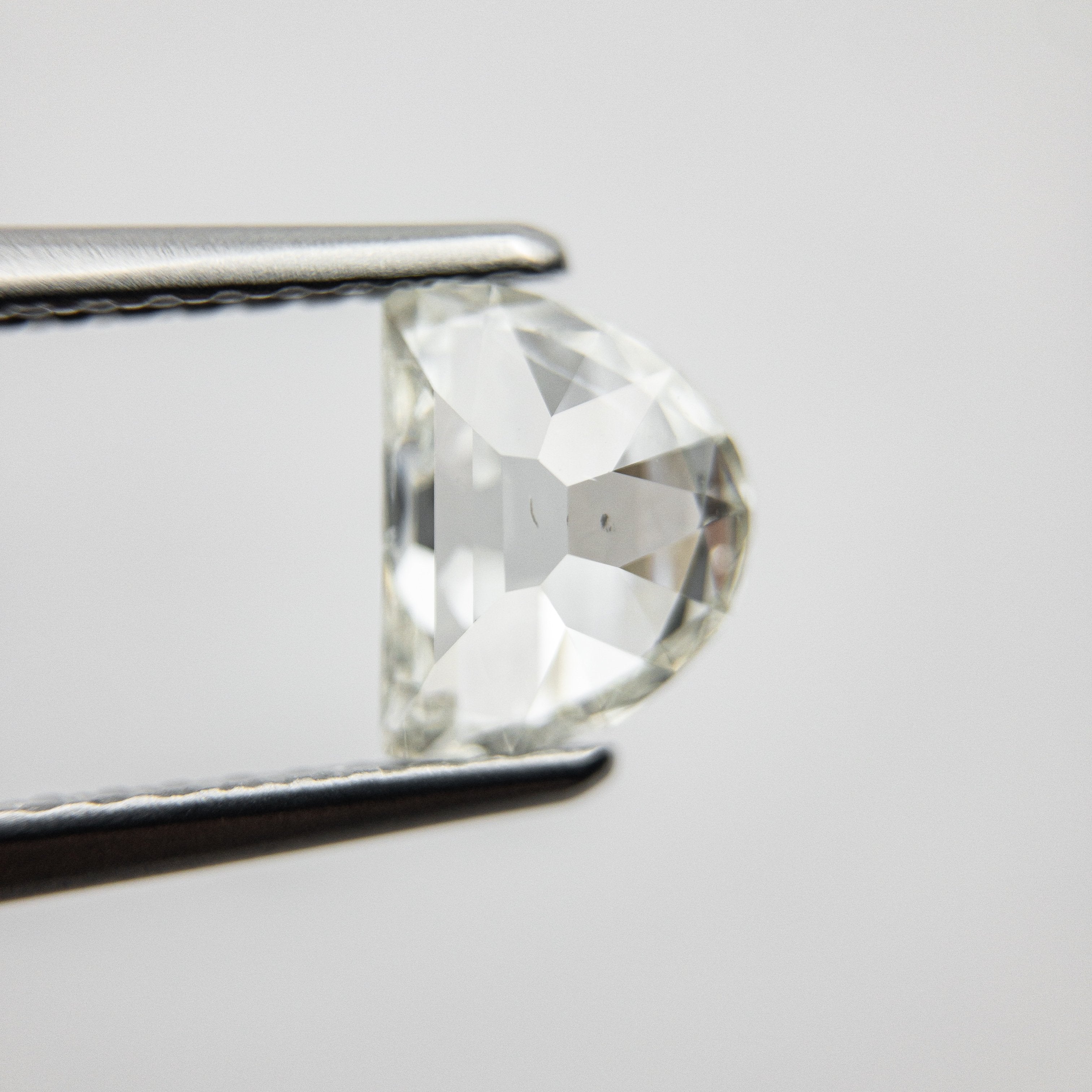 0.85ct 6.99x5.39x2.71mm Half Moon Modern Antique Cut 18129-10 hold D1425
