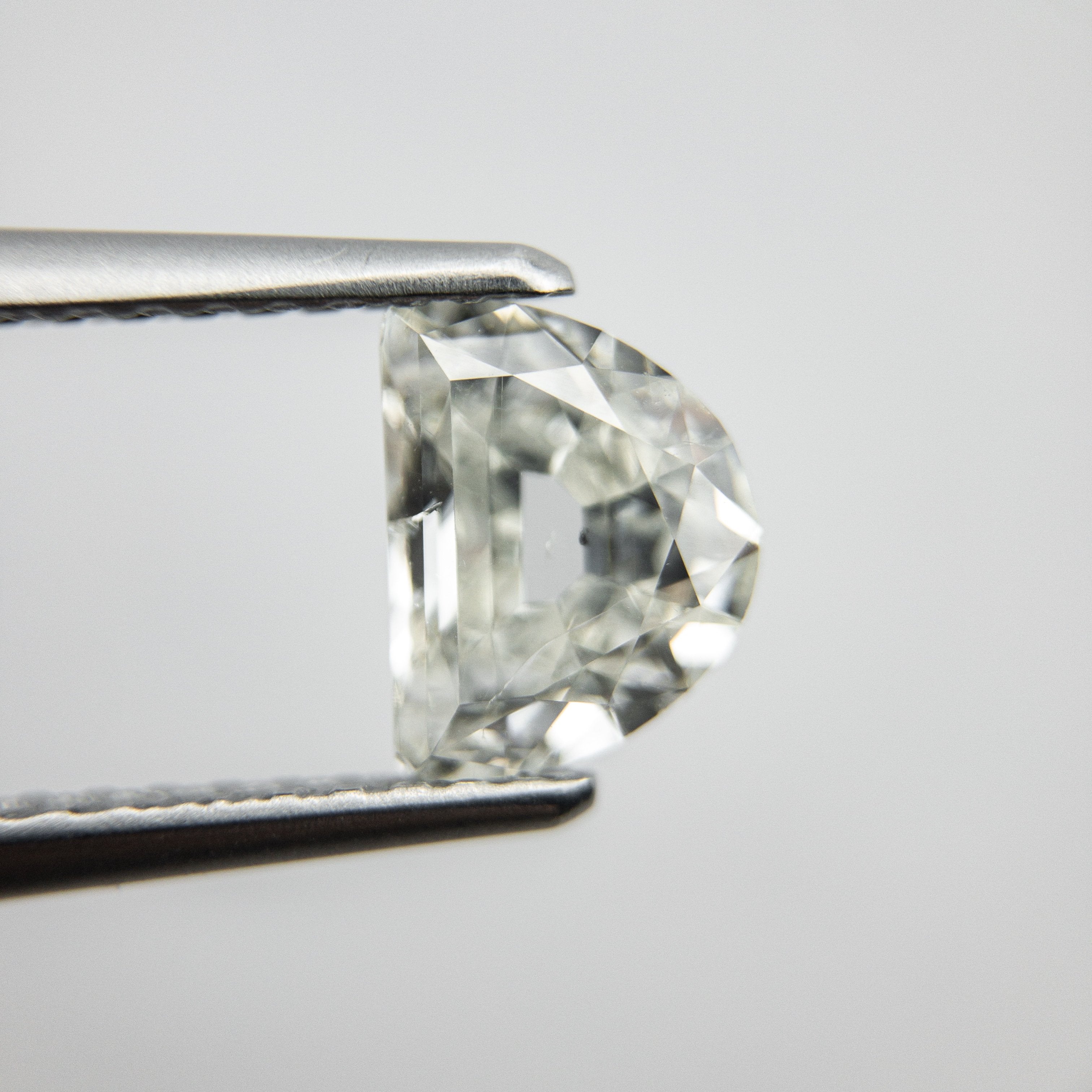 0.85ct 6.99x5.39x2.71mm Half Moon Modern Antique Cut 18129-10 hold D1425