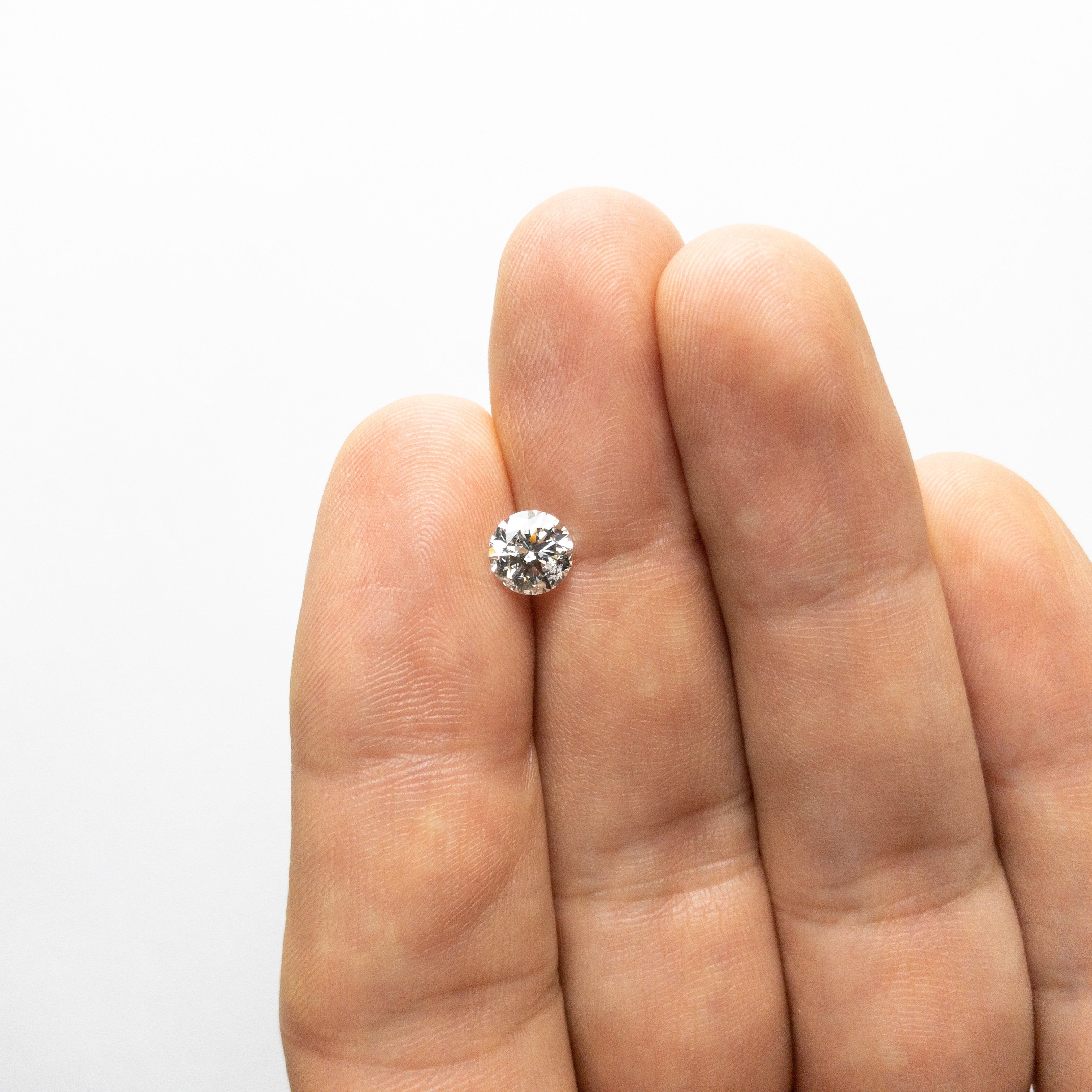 1.01ct 6.38x6.33x3.91mm SI2 E Round Brilliant 18130-03