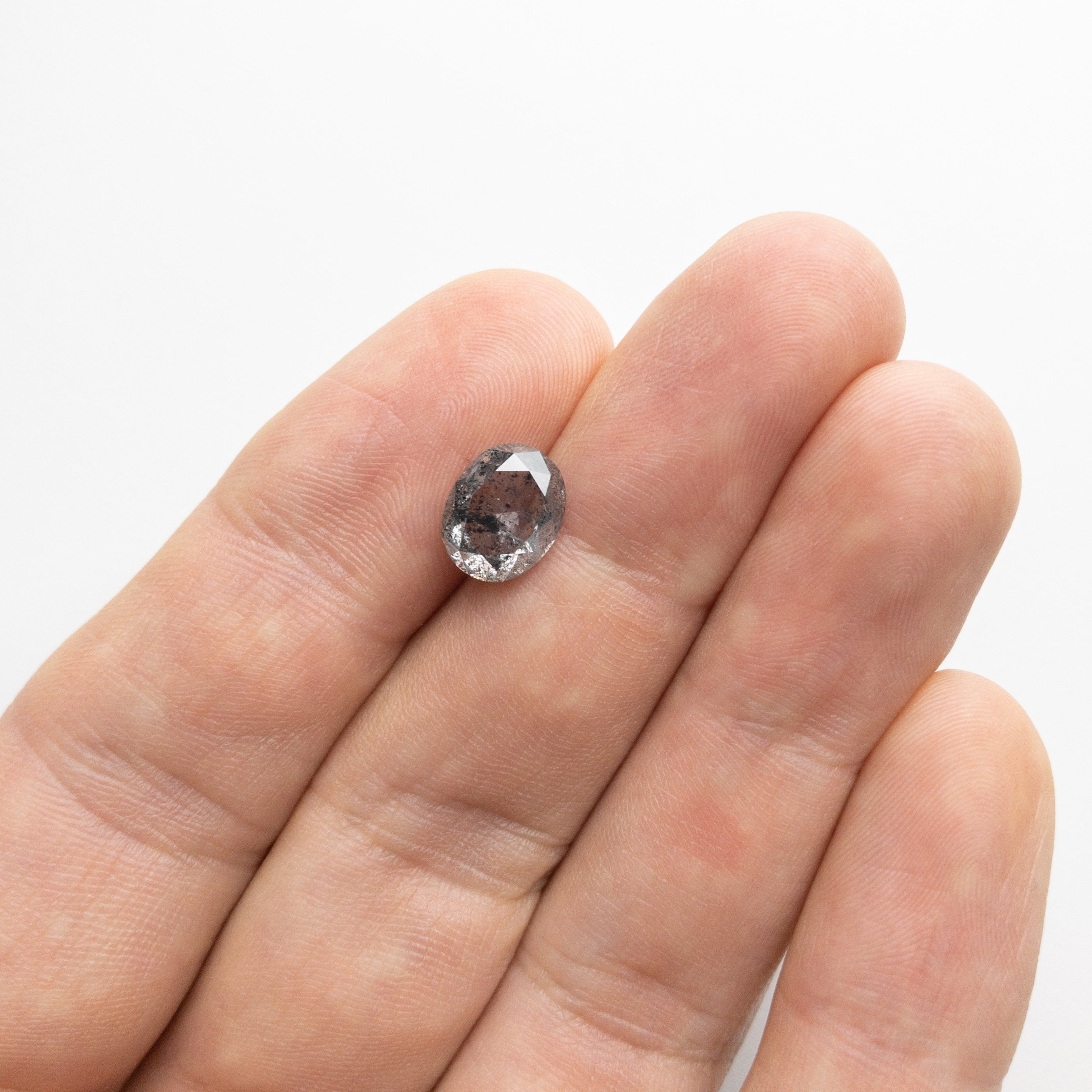 3.52ct 9.68x7.75x5.02mm Oval Double Cut 18143-01 hold D1067