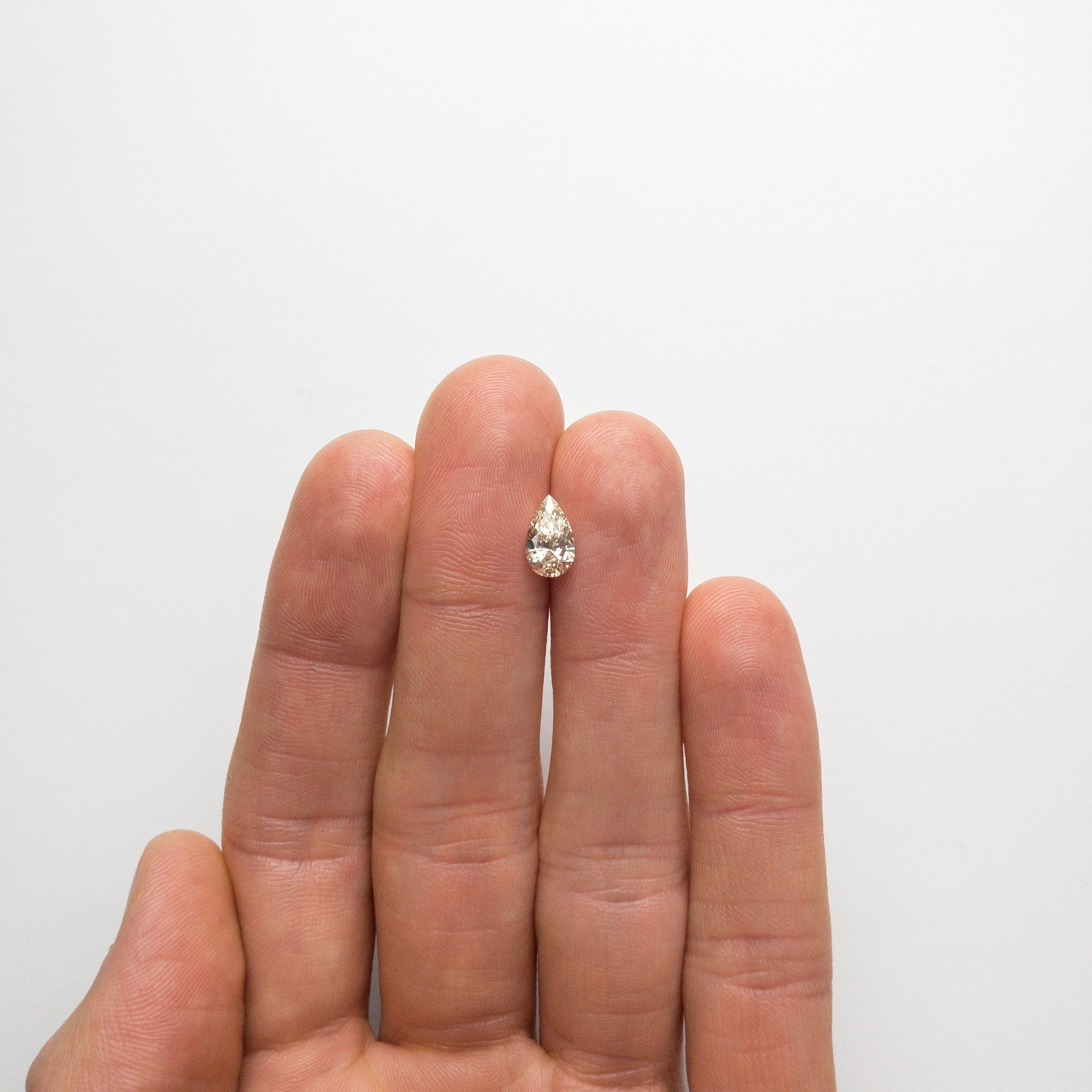 1.01ct 9.24x5.51x3.42mm Champagne Pear Brilliant 18145-01