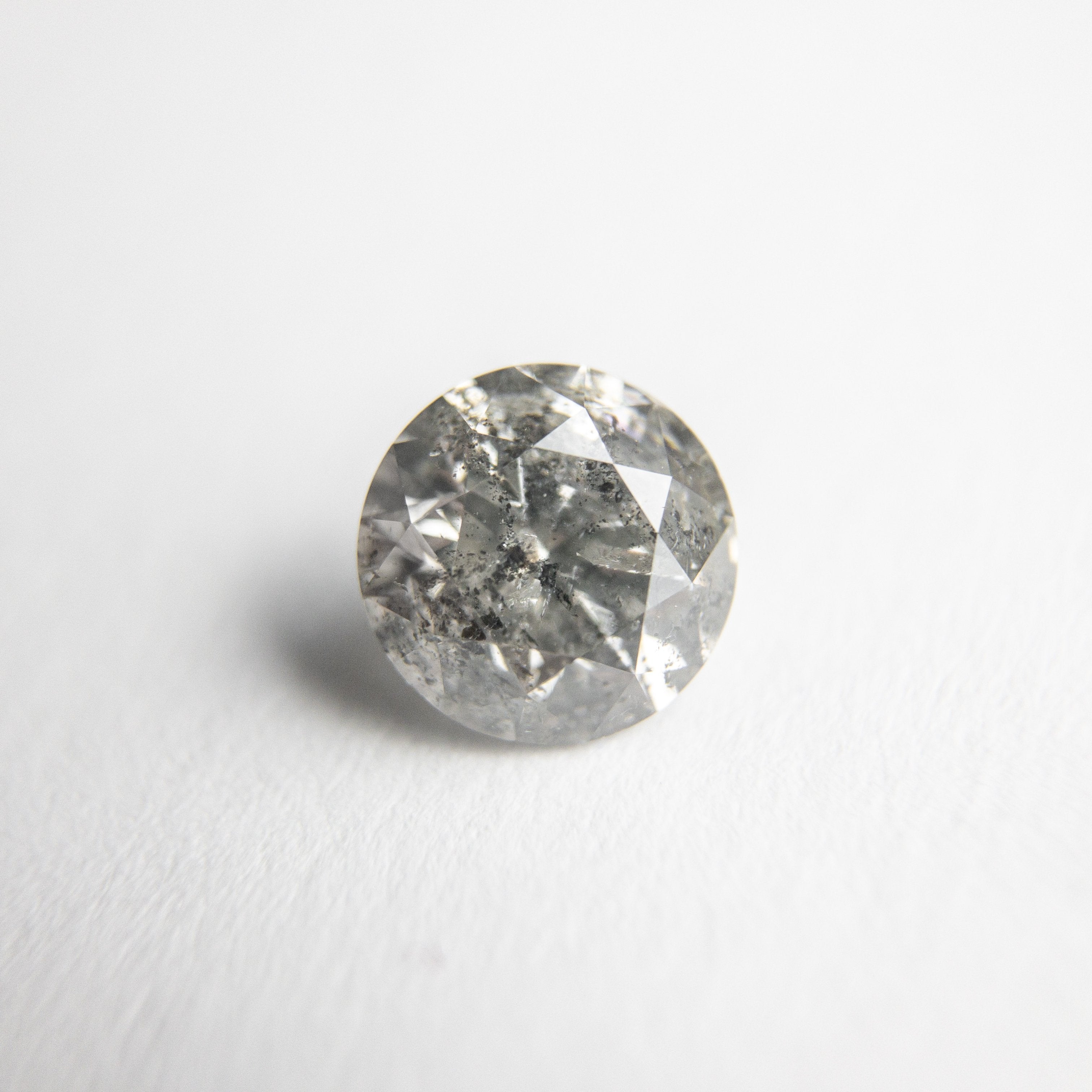 0.75ct 5.69x5.67x3.66mm Round Brilliant 18174-02 hold D1606