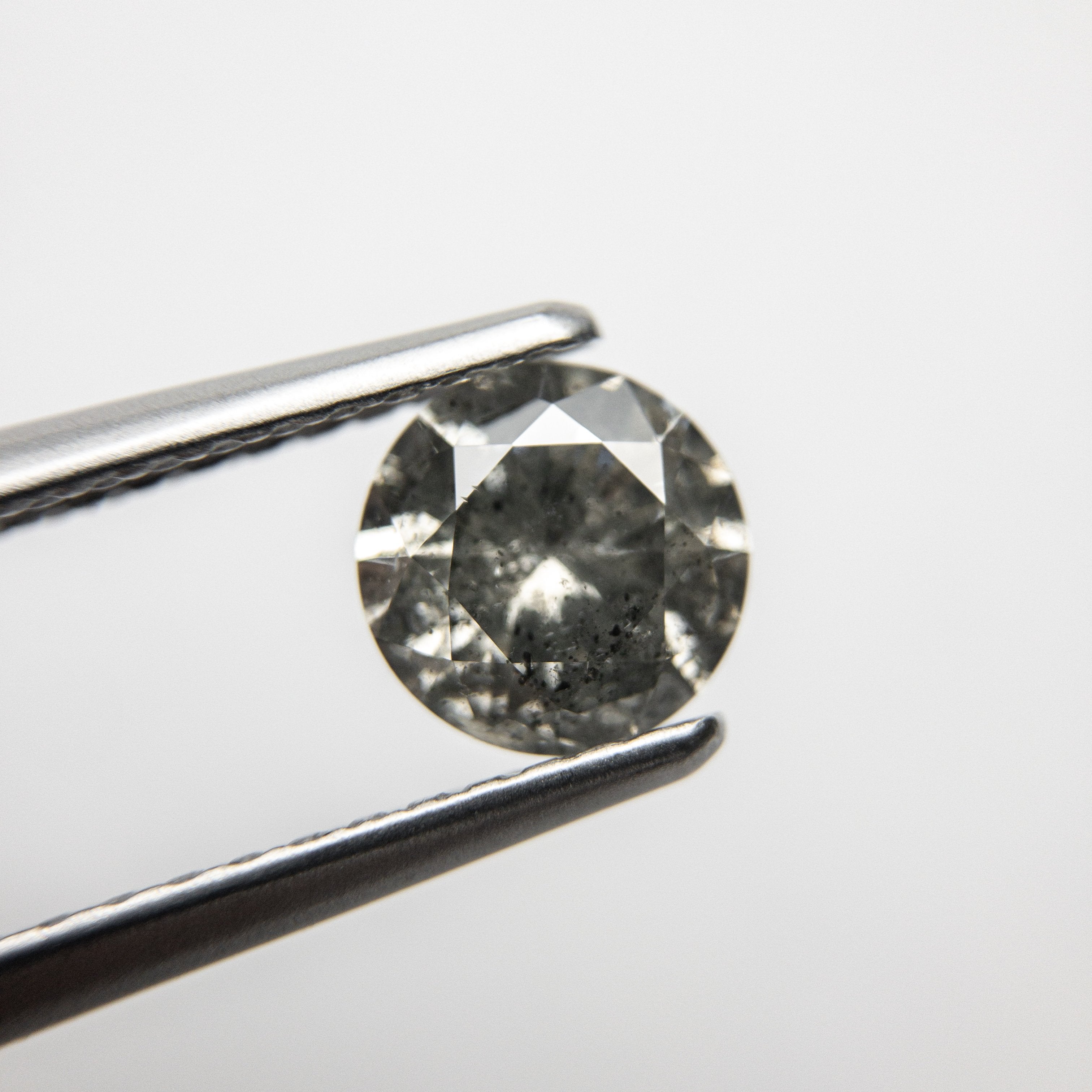 0.71ct 5.84x5.80x3.38mm Round Brilliant 18203-04 HOLD D1101