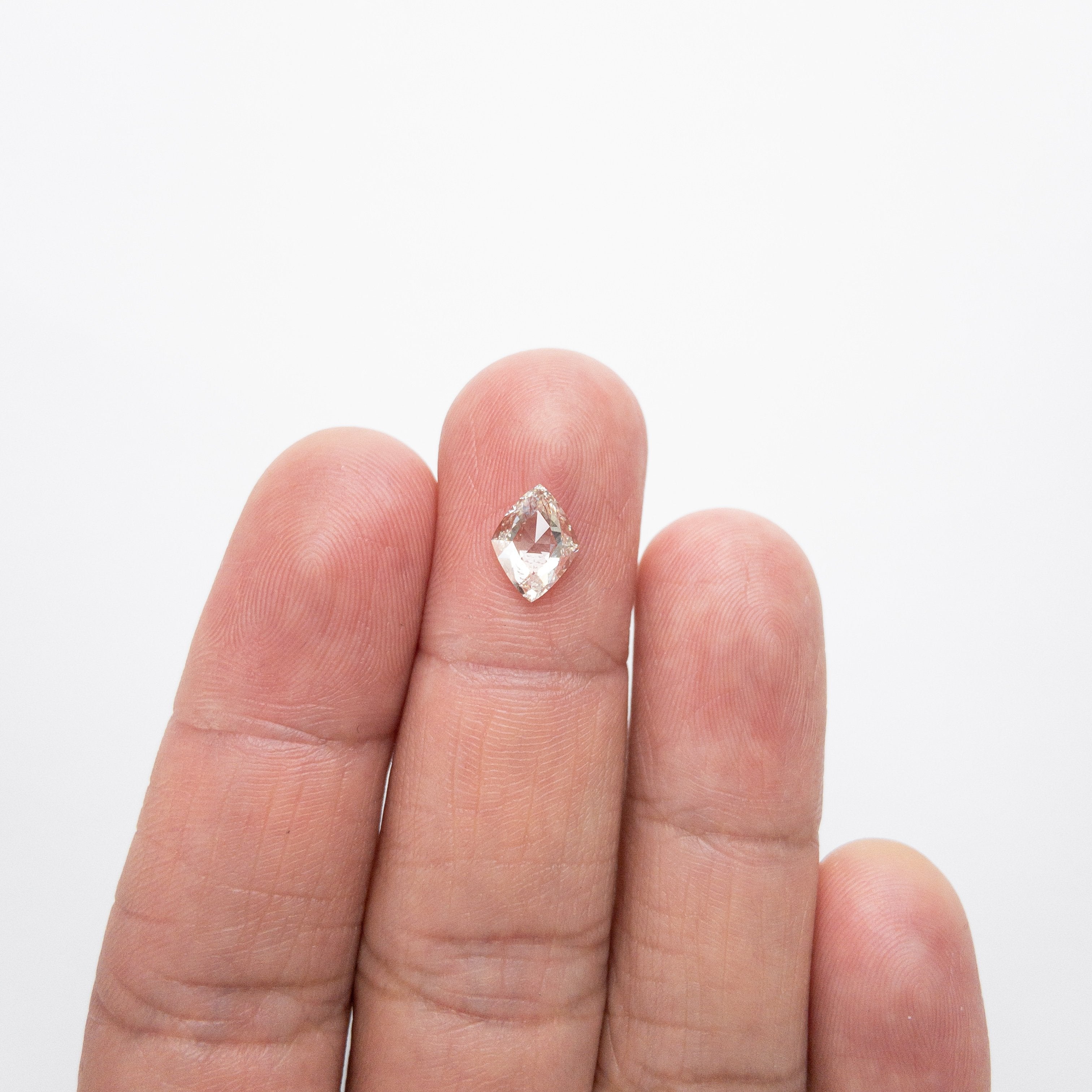 1.02ct 9.13x6.86x2.84 GIA VVS1 K Lozenge Brilliant 18204-01