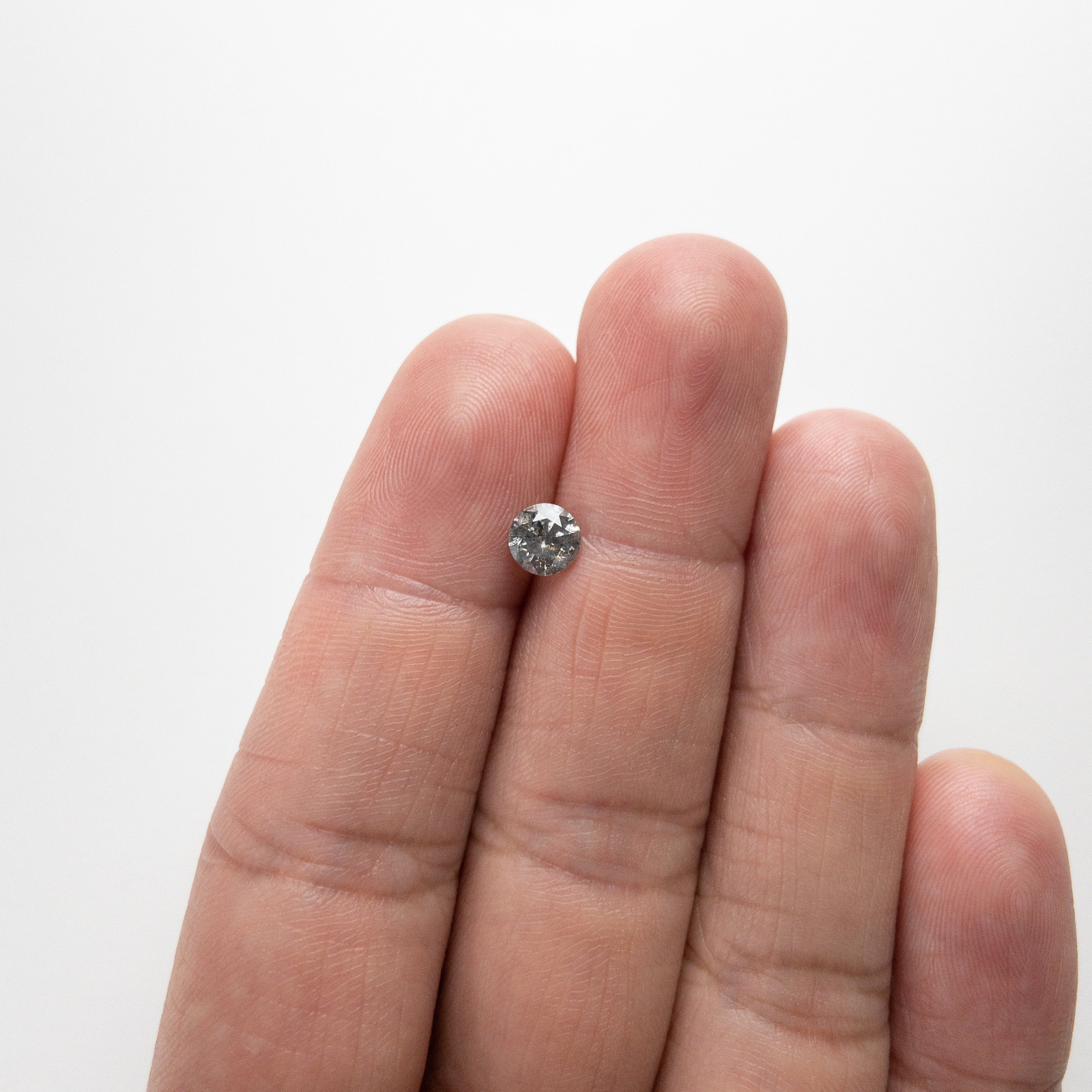 0.75ct 5.69x5.65x3.58mm Round Brilliant 18217-09 HOLD D972