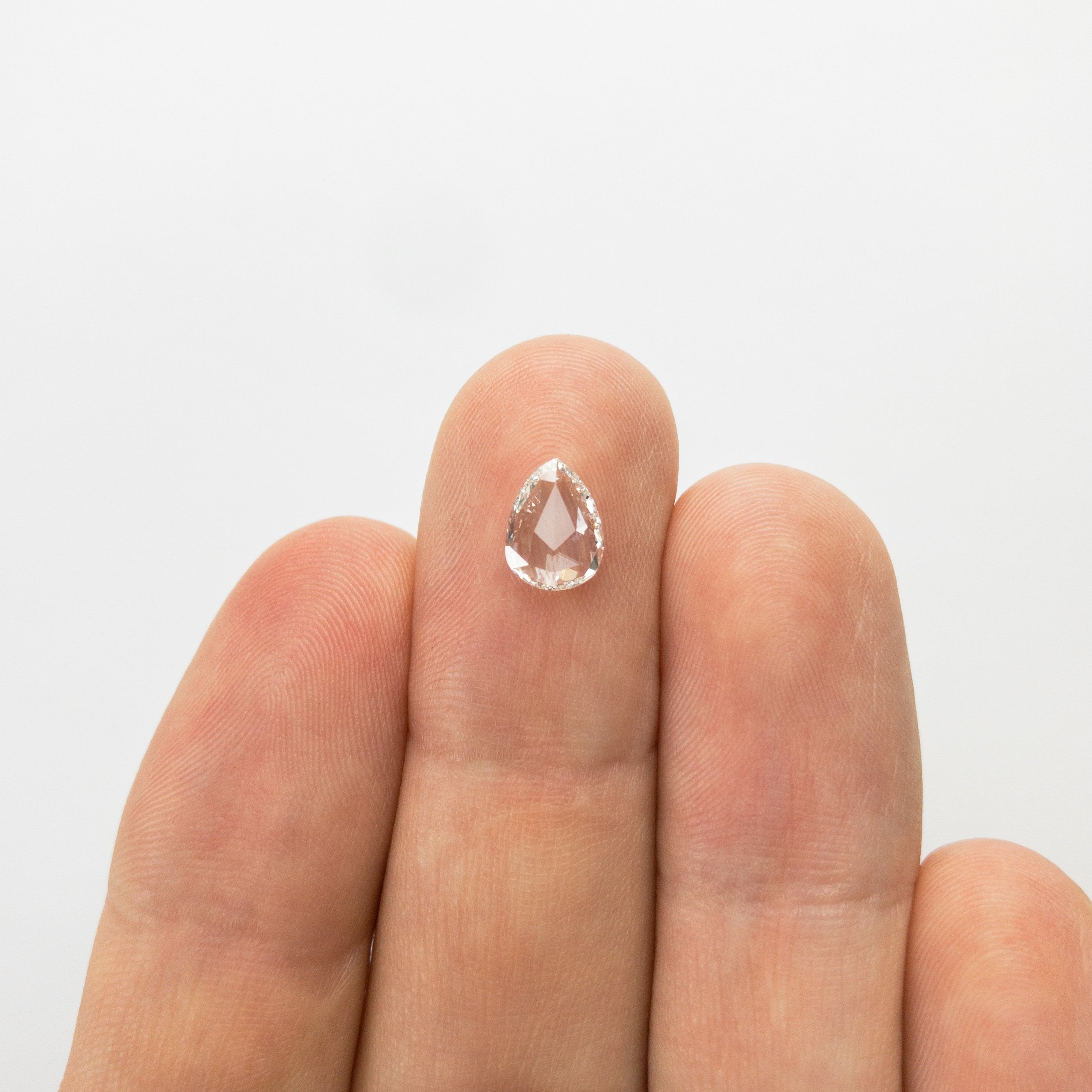 0.79ct 8.17x6.12x1.83mm SI1 G Pear Rosecut 18218-12