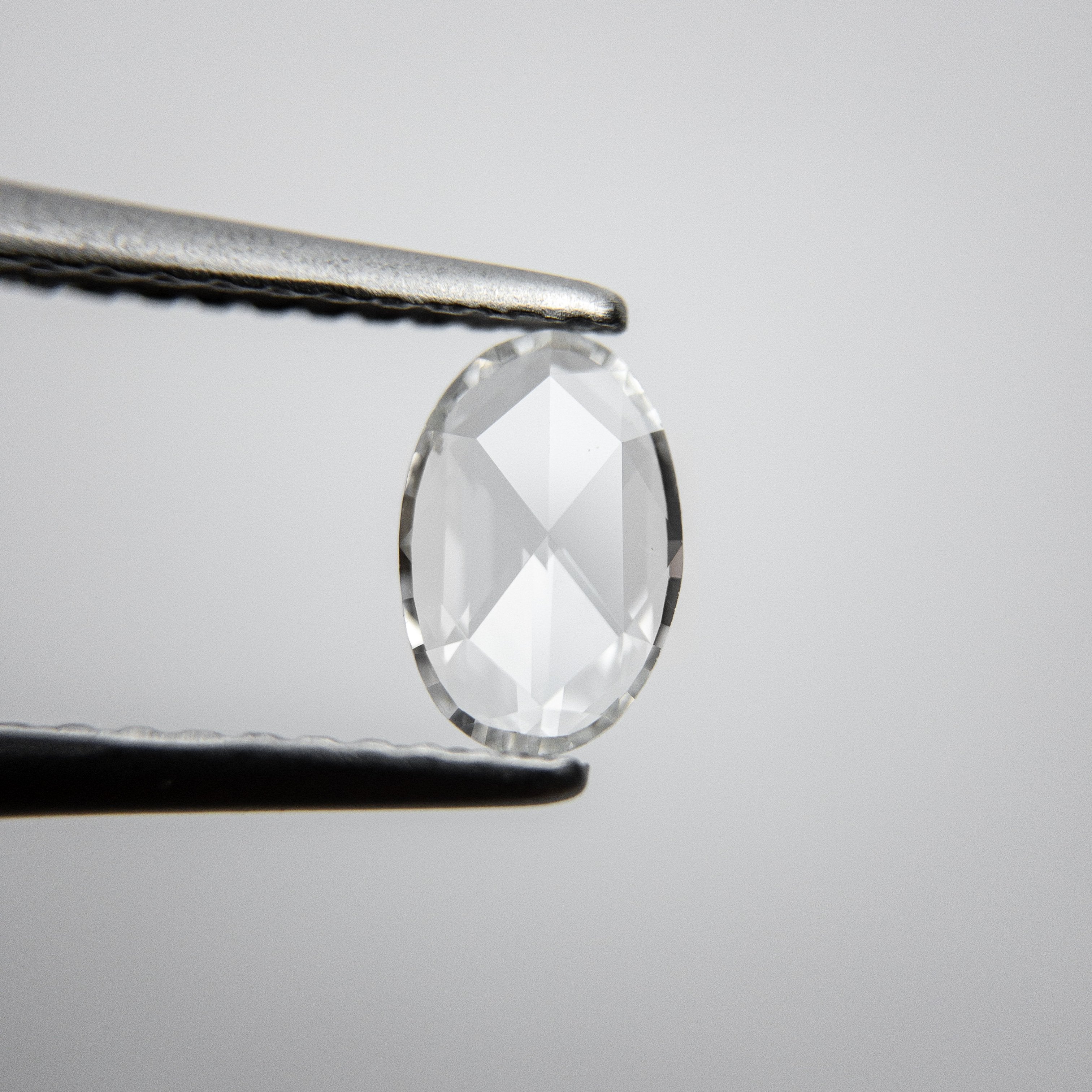 0.36ct 6.97x4.64x1.23mm Oval Rosecut 18237-01 hold D1390