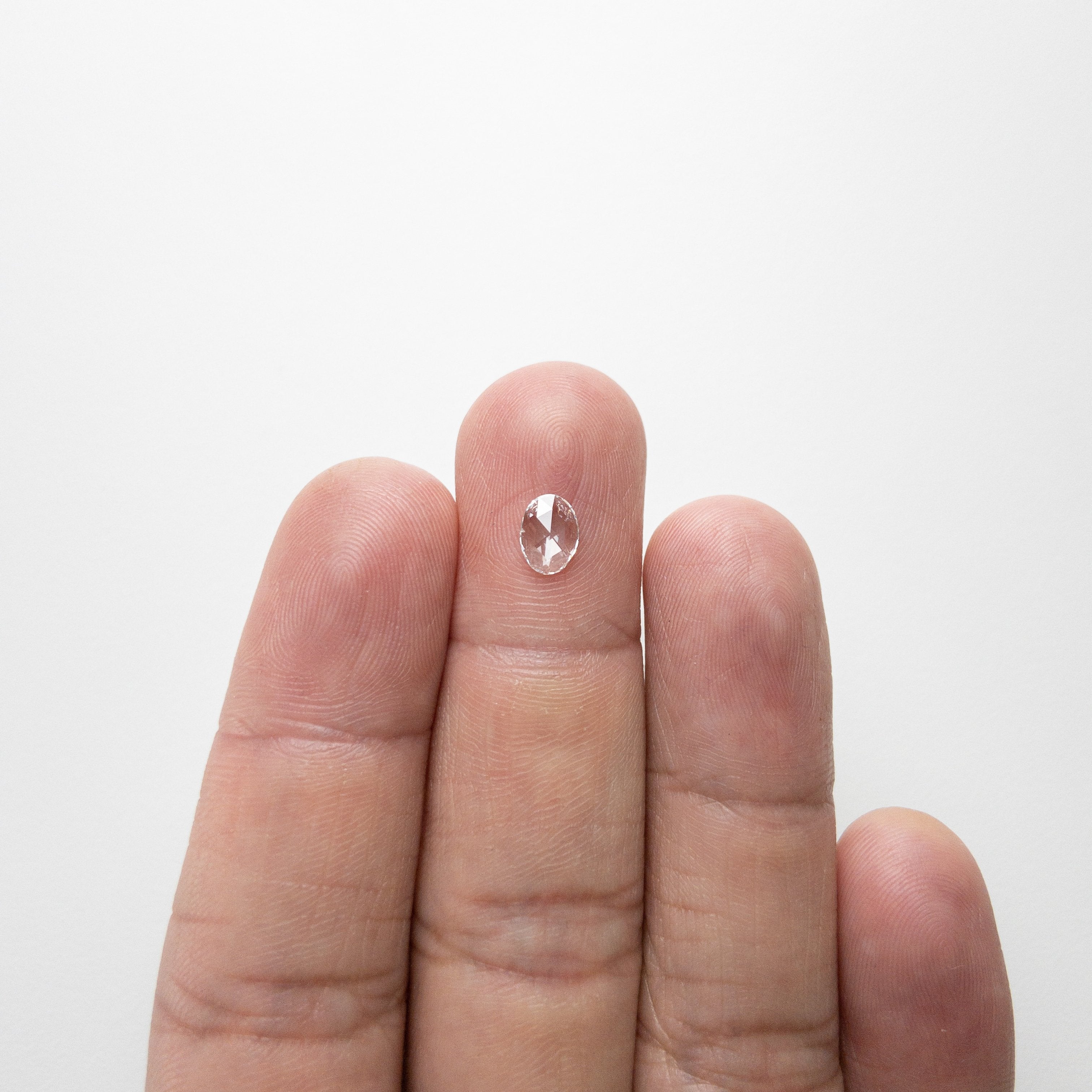 0.37ct 6.87x4.99x1.42mm Oval Rosecut 18237-04 hold D1390