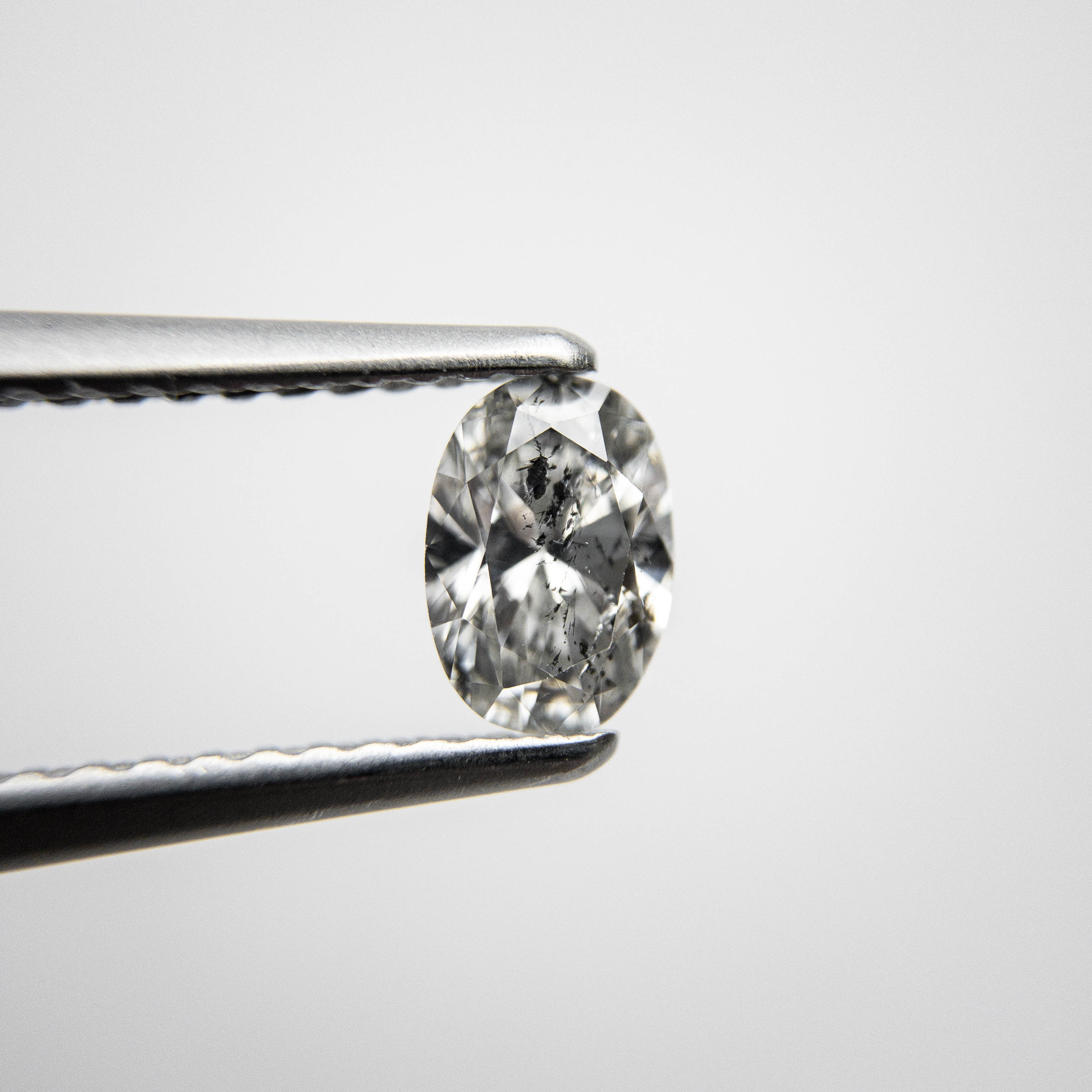 0.50ct 6.13x4.30x2.73mm Oval Brilliant Cut 18243-08 hold d961