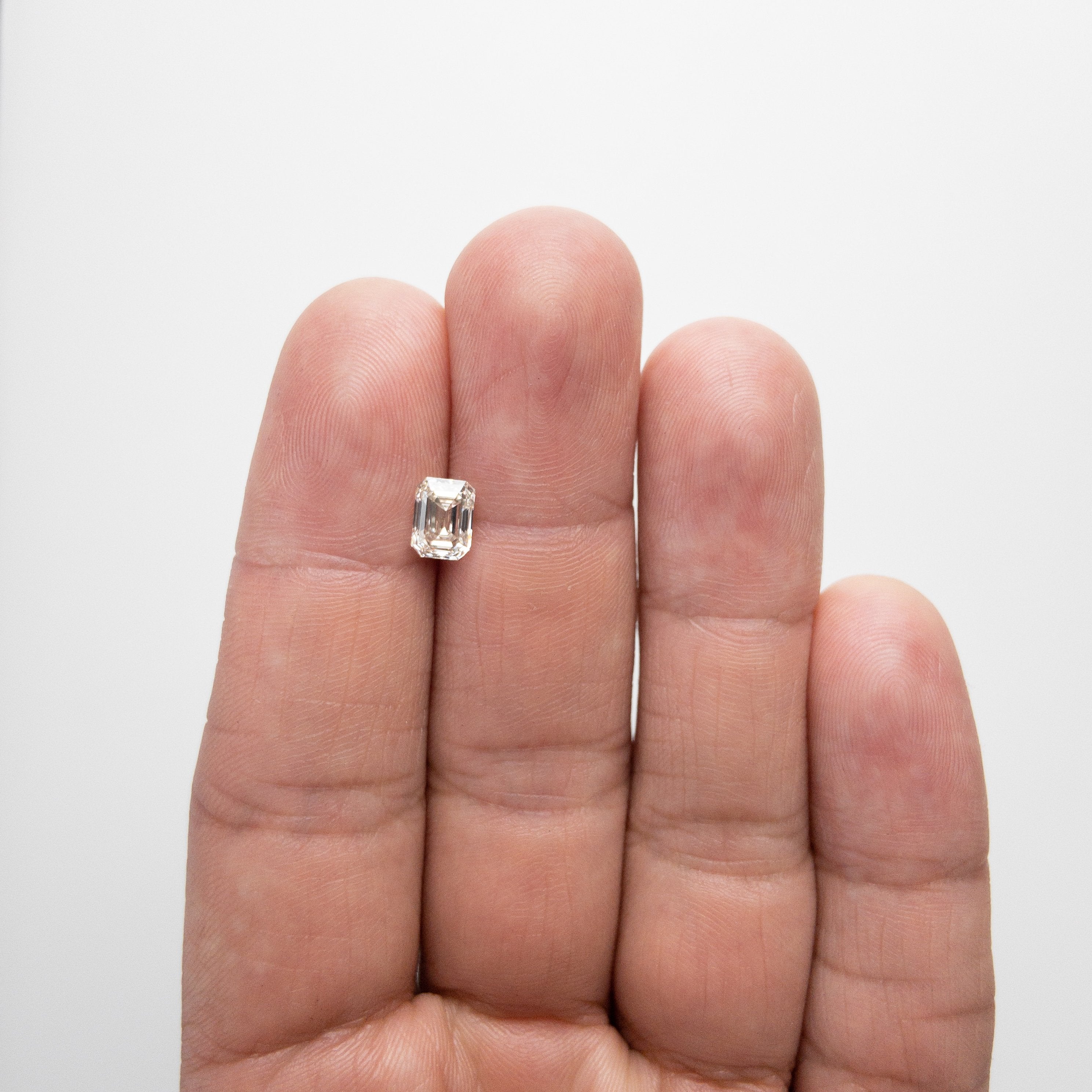 1.17ct 6.92x5.07x3.52mm Emerald Cut 18244-11 HOLD D931