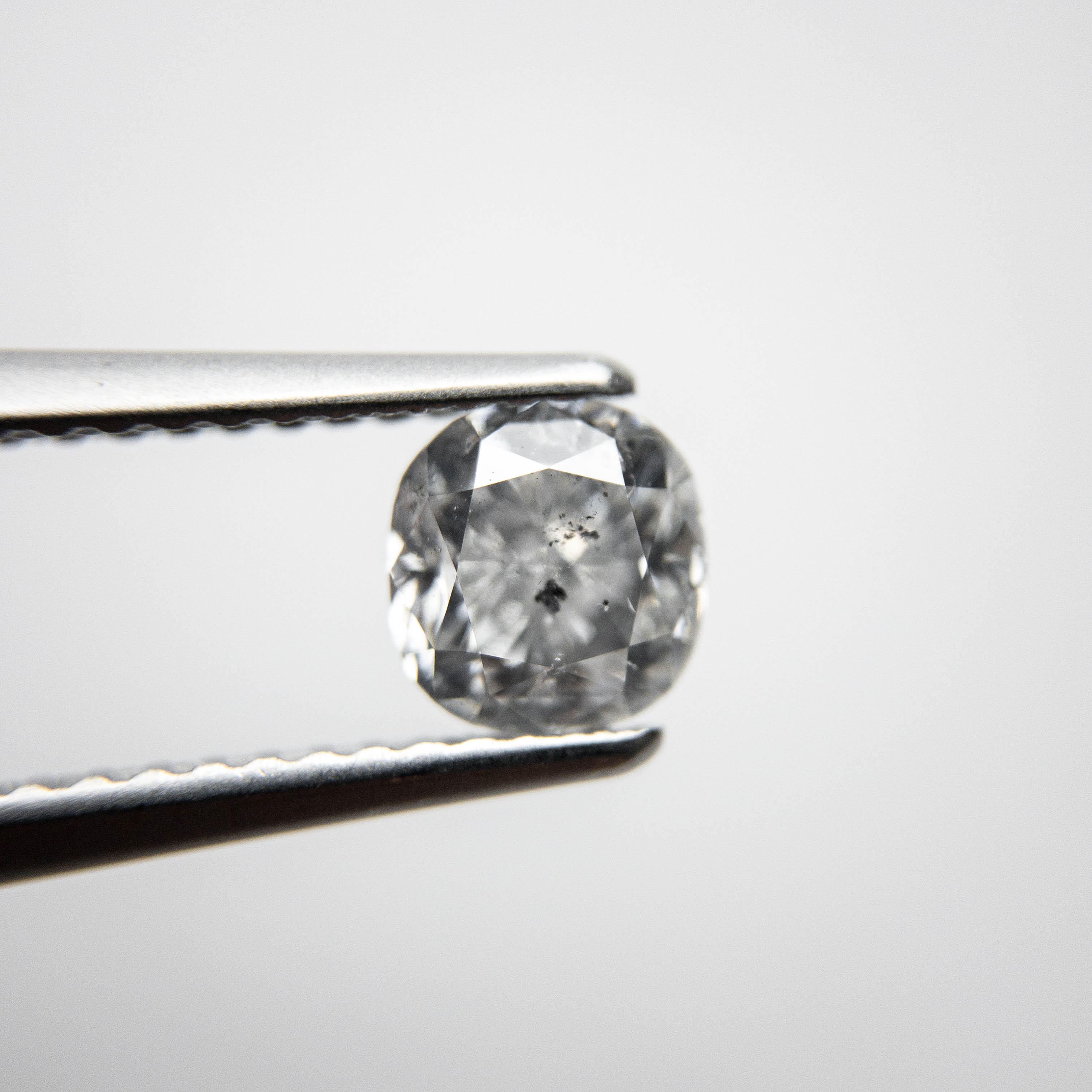 1.07ct 6.46x5.65x3.30mm Cushion Cut 18245-02 hold D1649