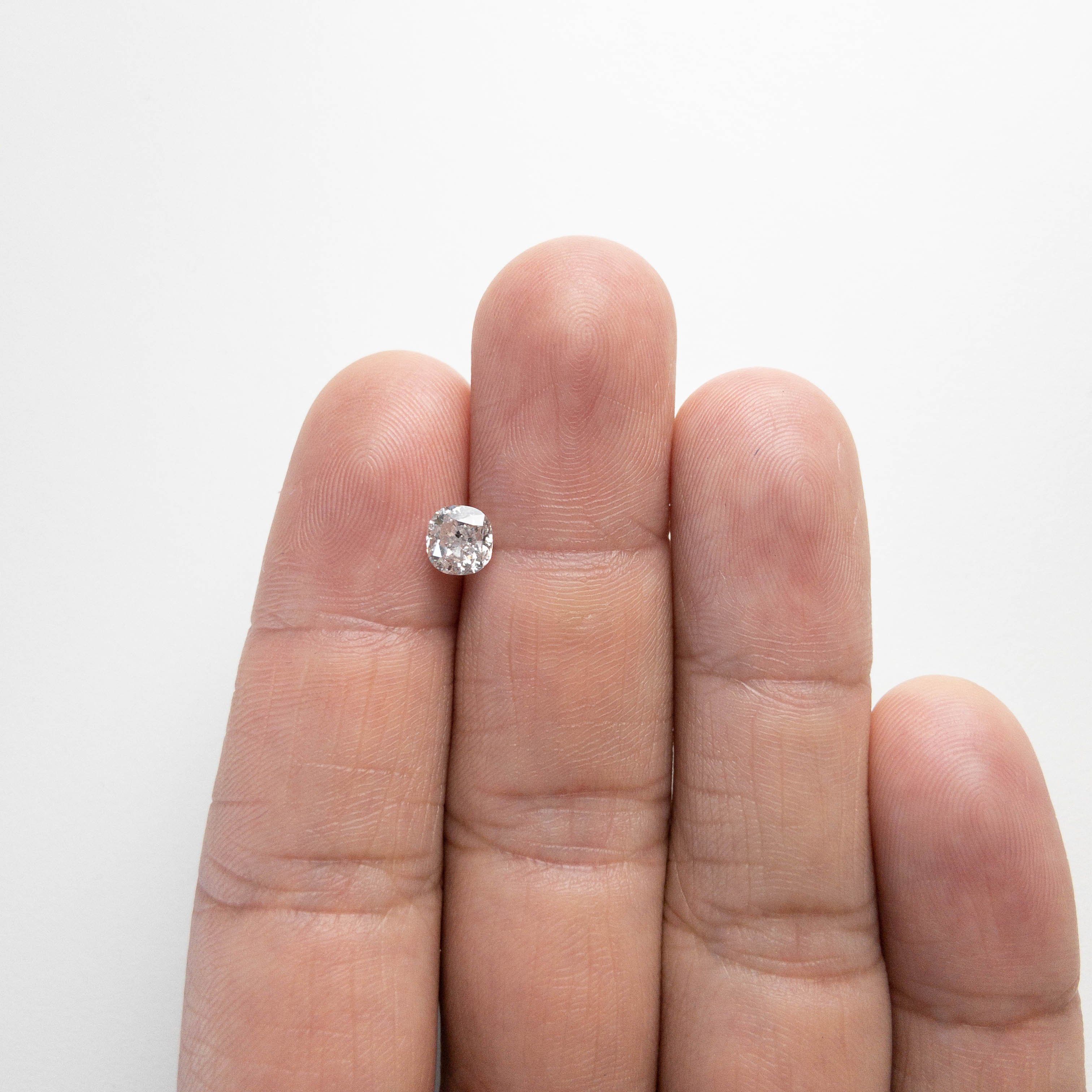 1.07ct 6.46x5.65x3.30mm Cushion Cut 18245-02 hold D1649