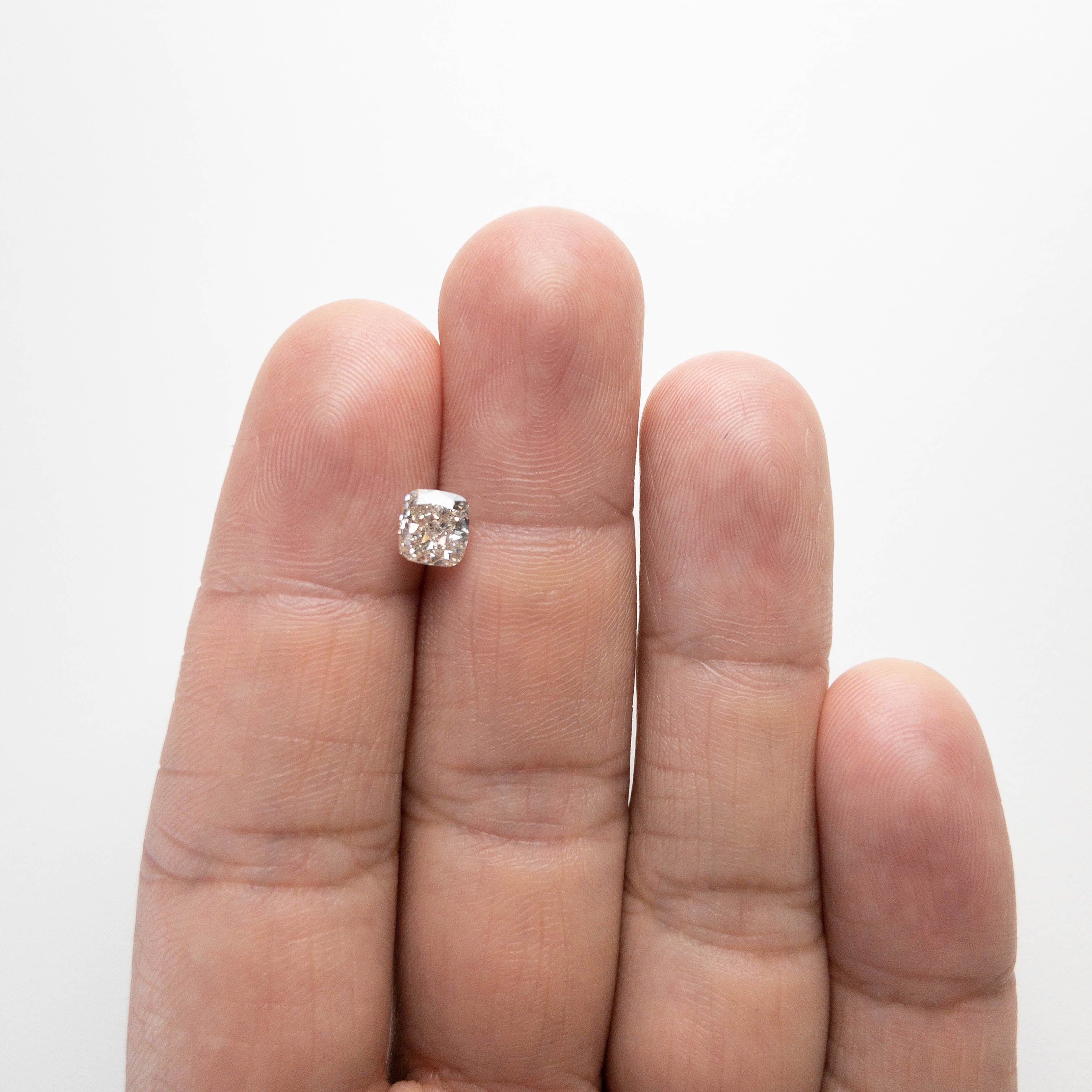 1.15ct 6.04x5.58x3.82mm Cushion Cut 18246-02 hold d1242