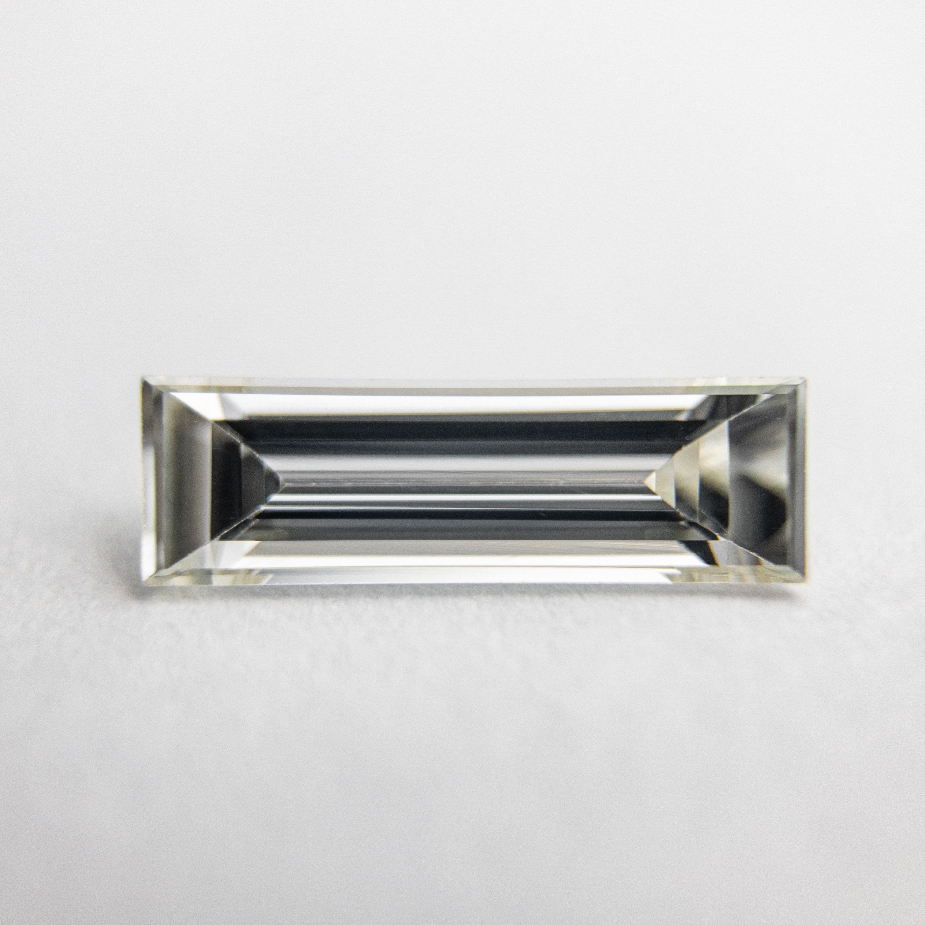 0.55ct 9.70x3.00x1.88mm VS2 K Baguette Step Cut 18279-01 HOLD D1159 9/15/20